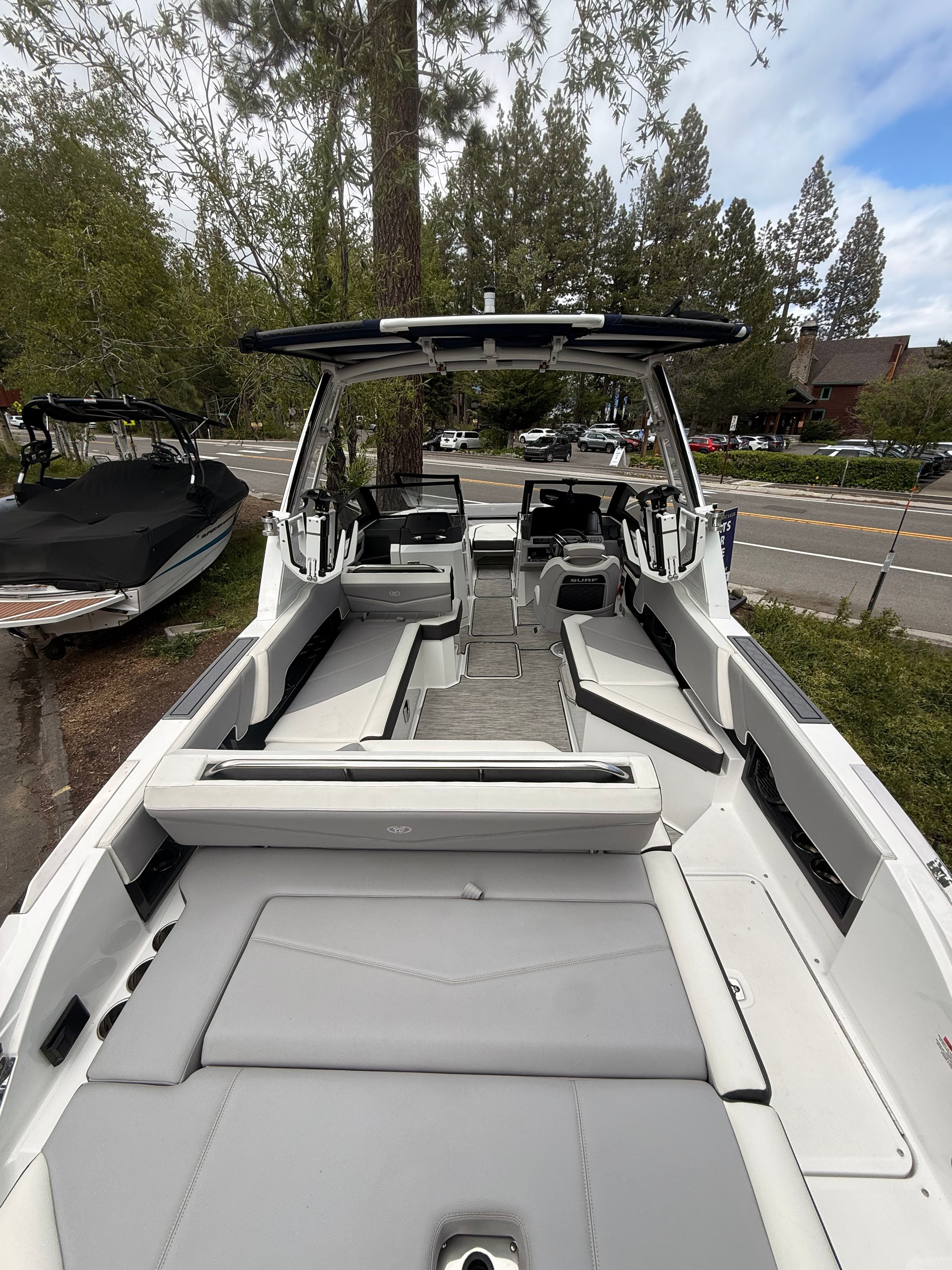 The image shows the interior of a 2022 Cobalt R8 Surf boat with gray seating.