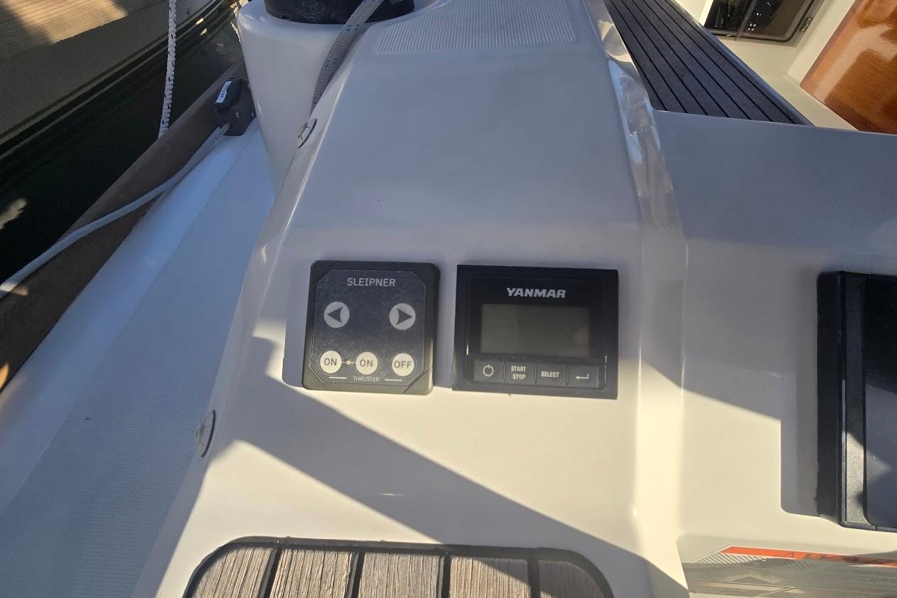 Control panel on 2023 Beneteau Oceanis 38.1 sailboat, featuring Sleipner and Yanmar displays.