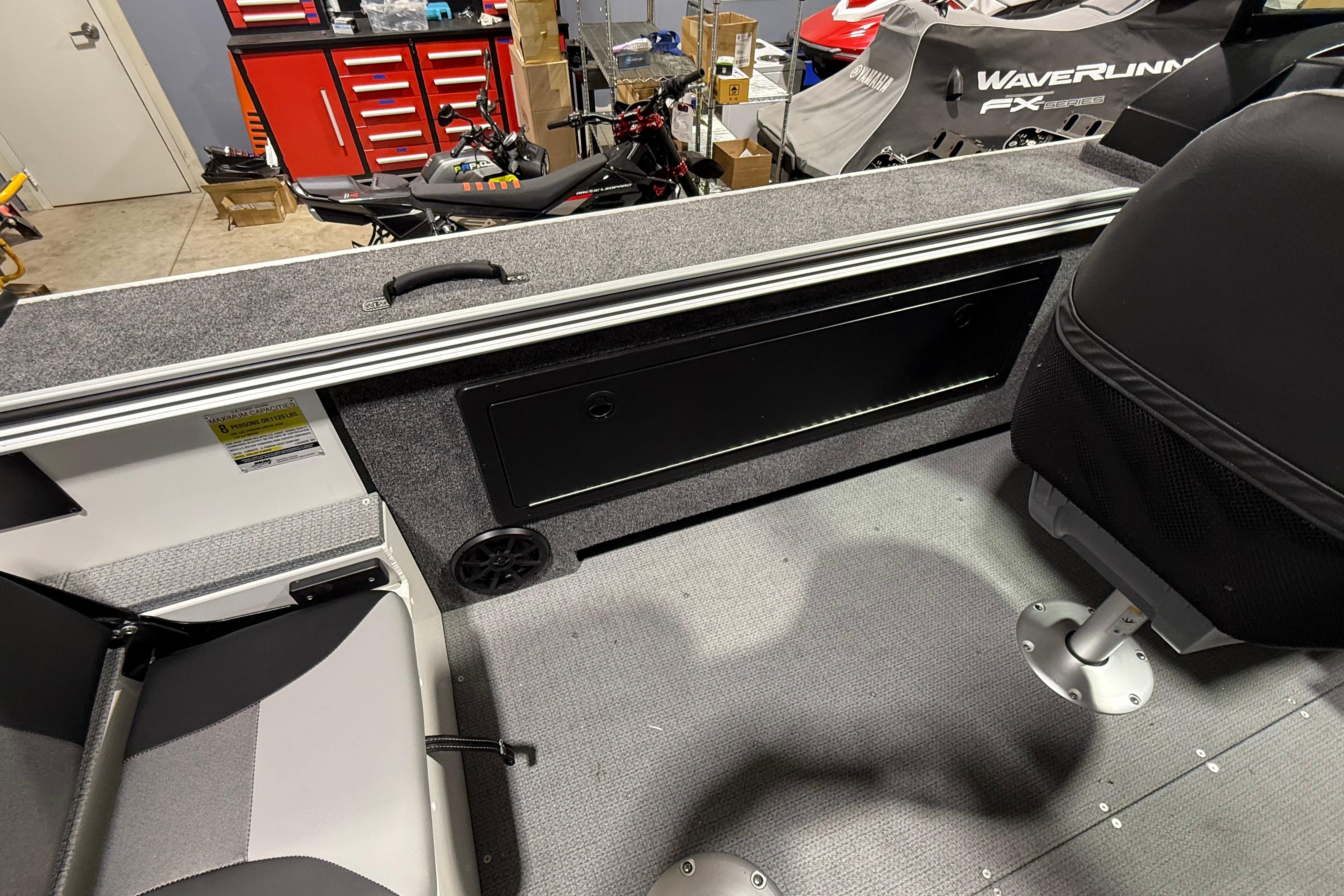 2025 G3 Angler V1850 SF boat interior with seating and storage compartments.