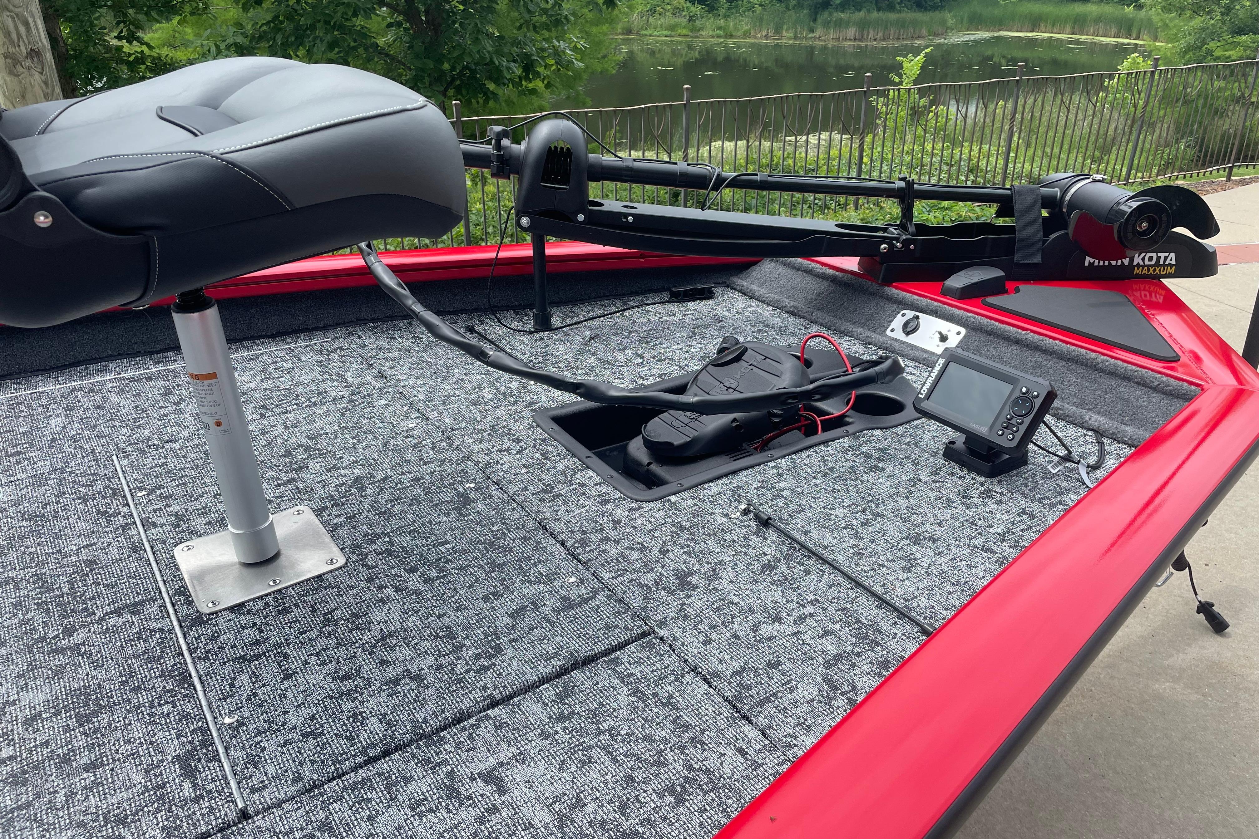 2026 Tracker Pro Team 190 boat deck with seat, trolling motor, and fish finder.