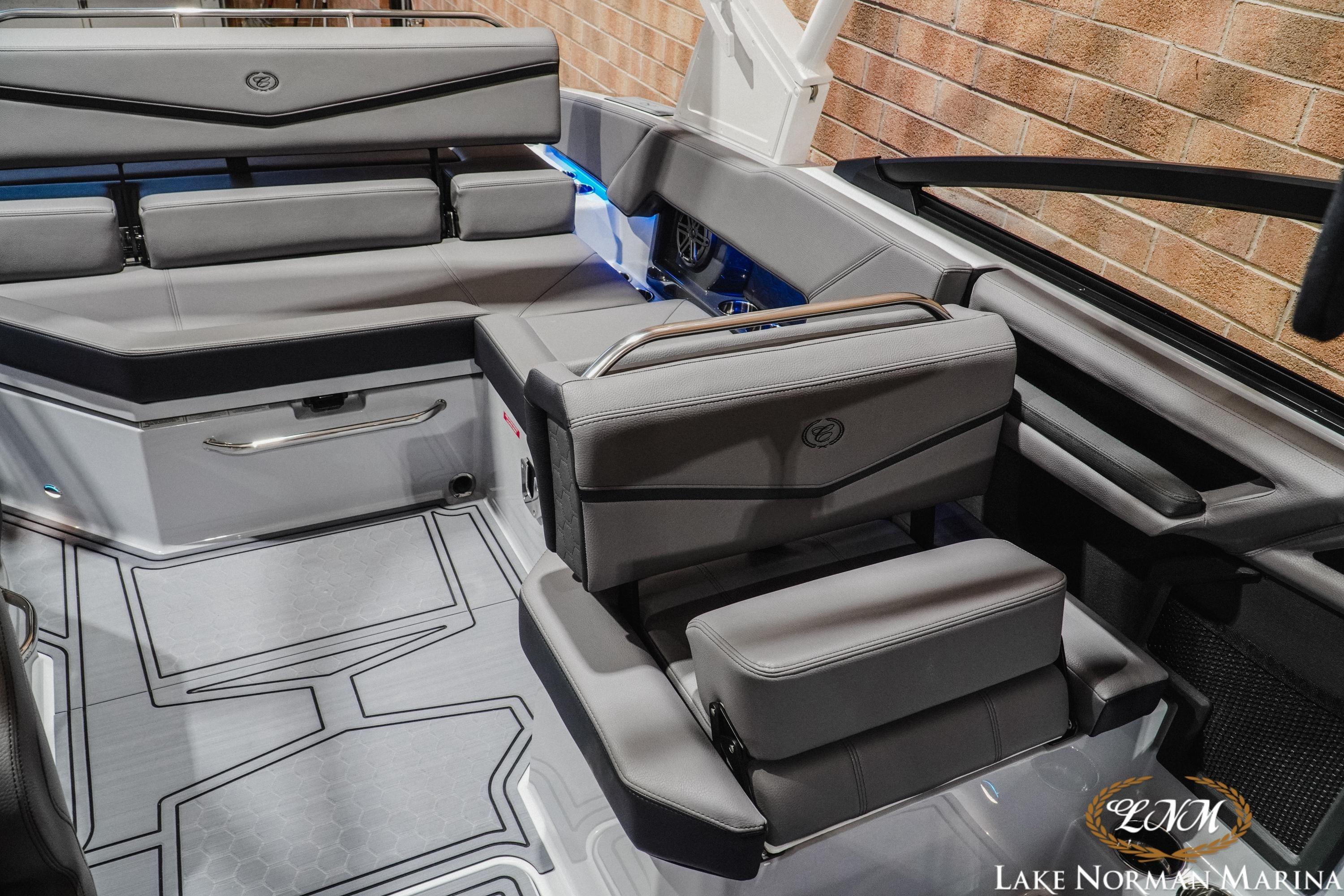 2026 Cobalt R4 Surf boat interior with sleek gray seating and modern design.