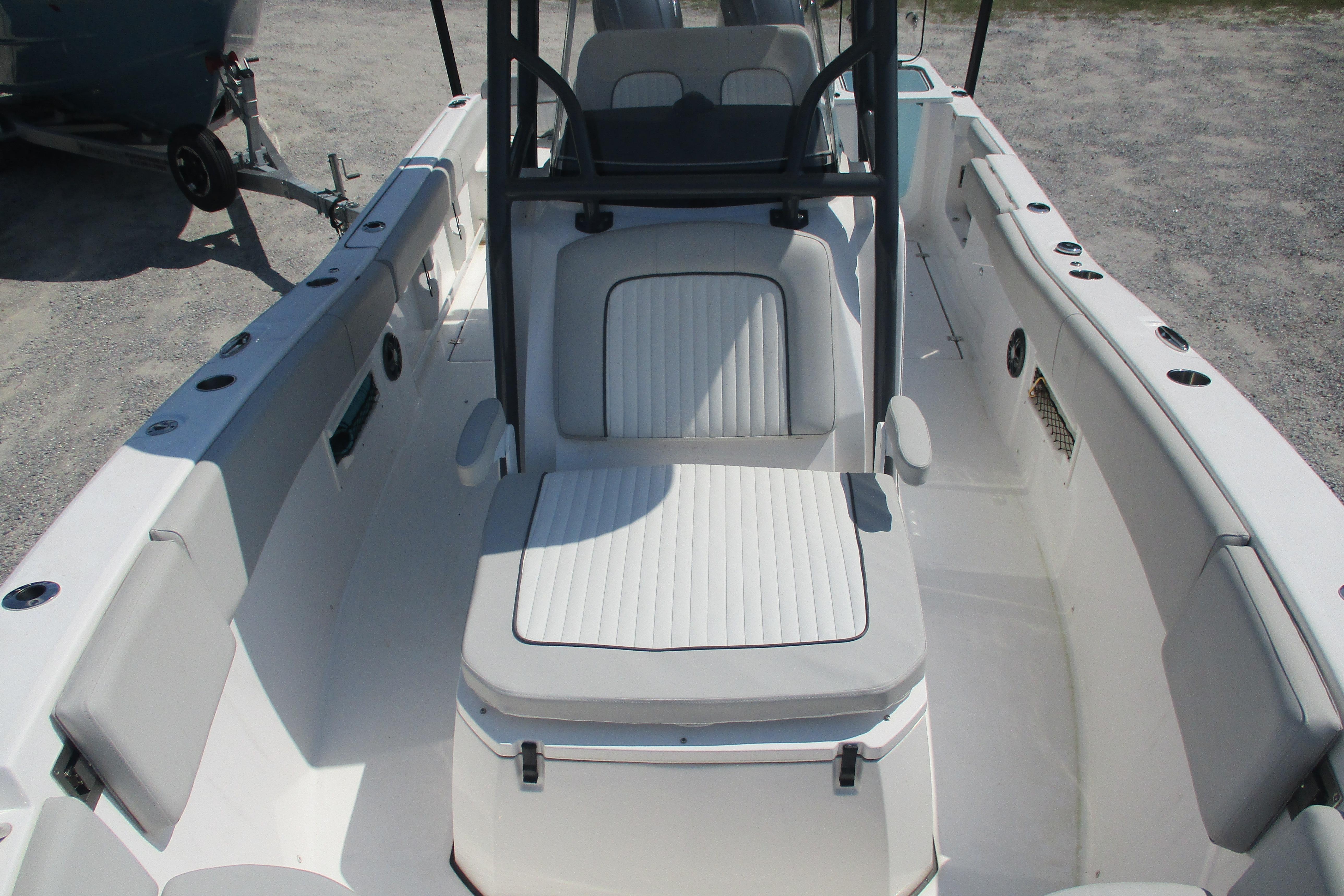 2024 Sea Fox 268 Commander boat interior with cushioned seating and spacious deck.