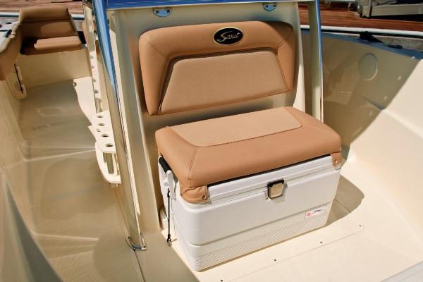 Manufacturer Provided Image: 2020 Scout 195 Sportfish boat with tan cushioned seating and integrated cooler.