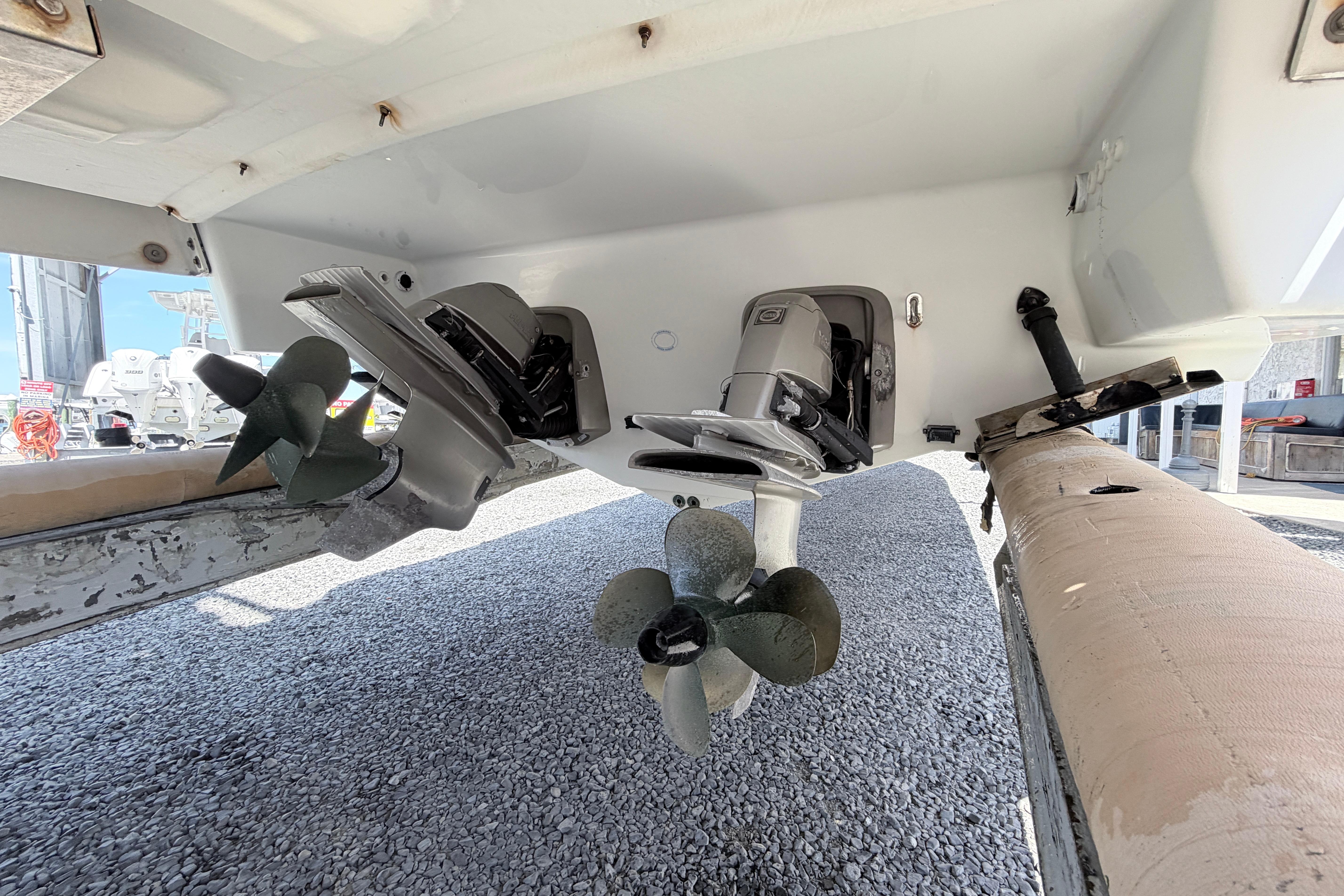 2015 Formula 350 Crossover Bowrider's dual propellers and stern drive detail.