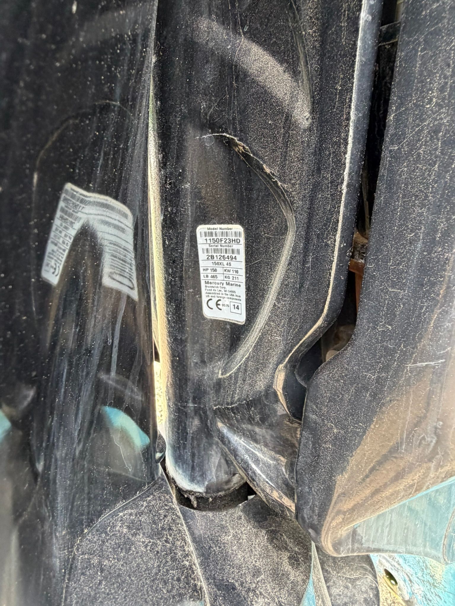 Close-up of a boat sticker with technical information.