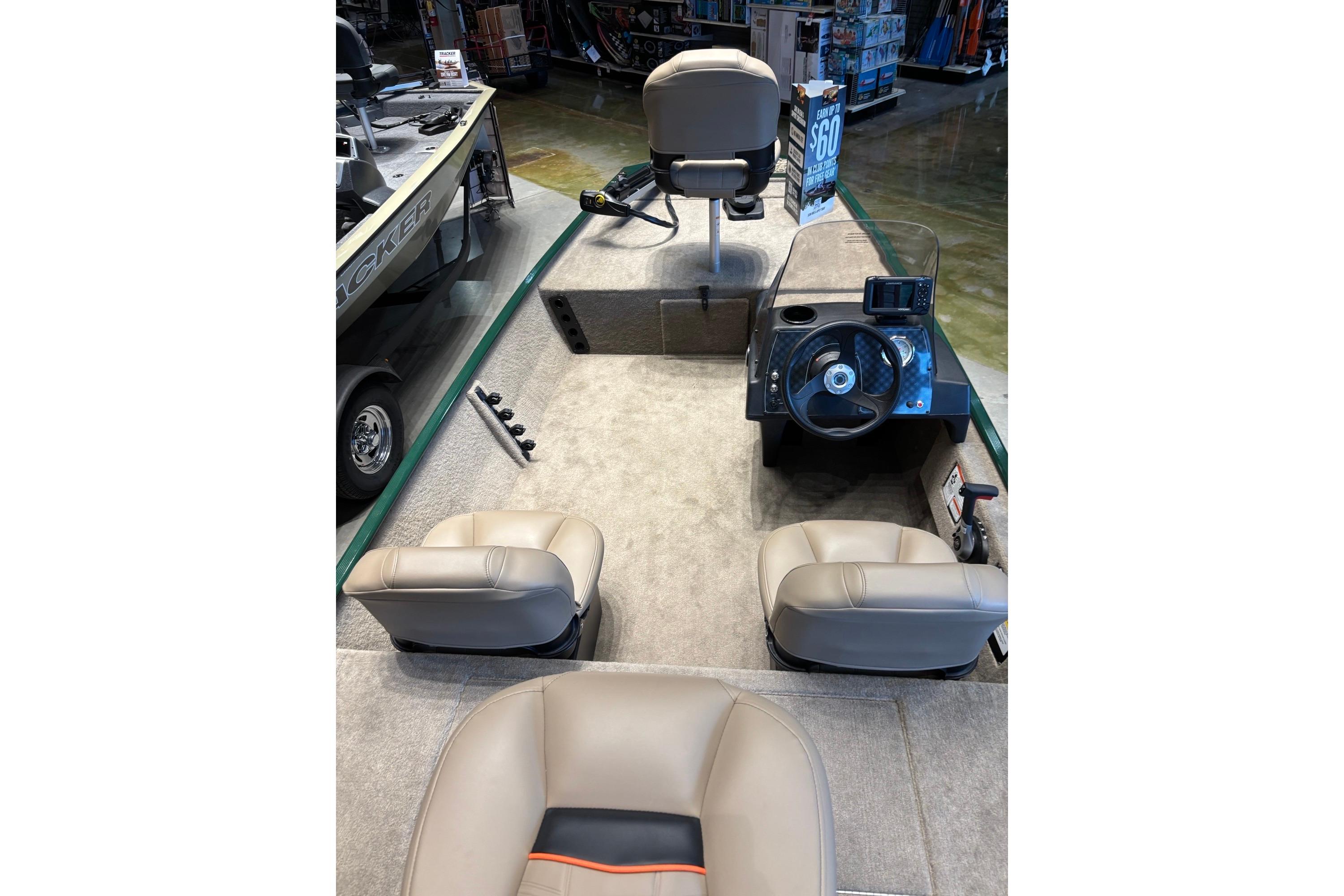 2026 Tracker Bass Tracker Classic Limited boat interior with seating and steering console.