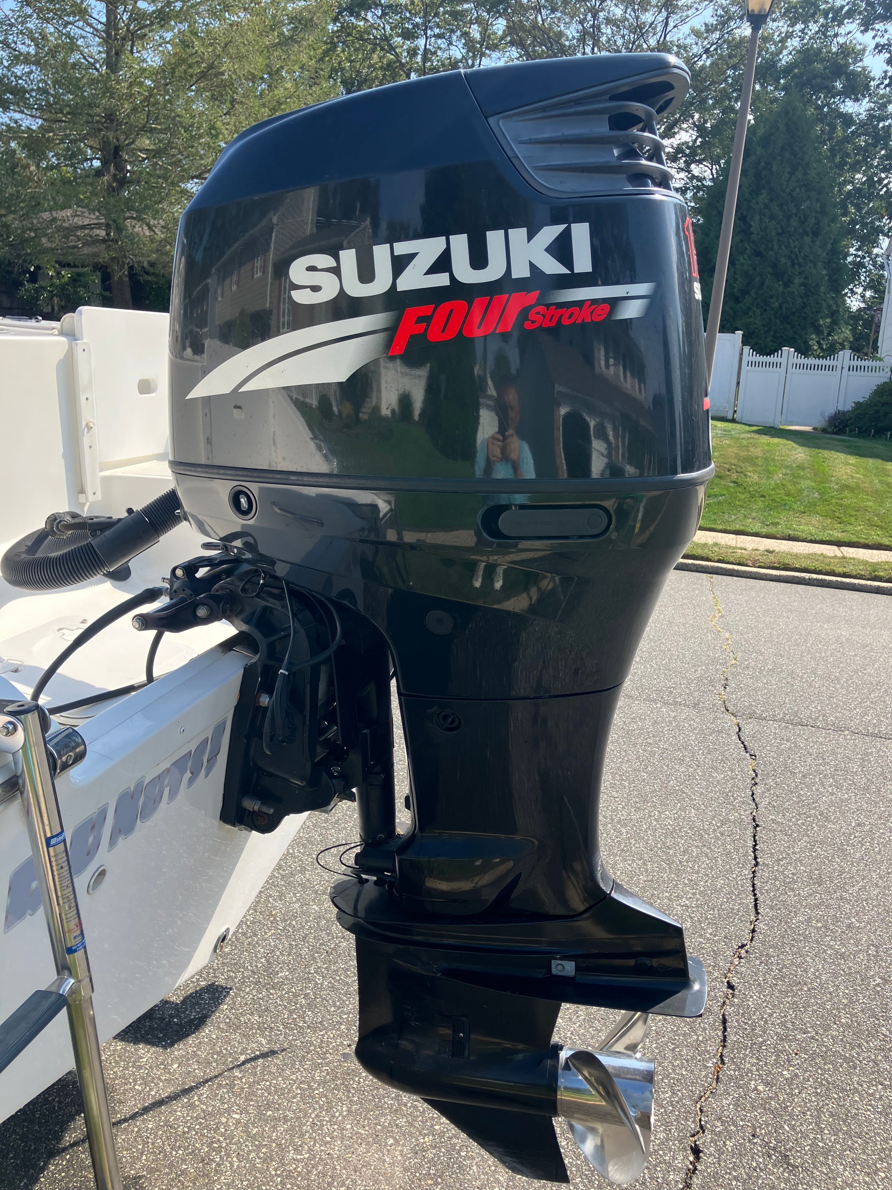 Suzuki outboard motor, Four Stroke, on a Custom 216wa pro boat.
