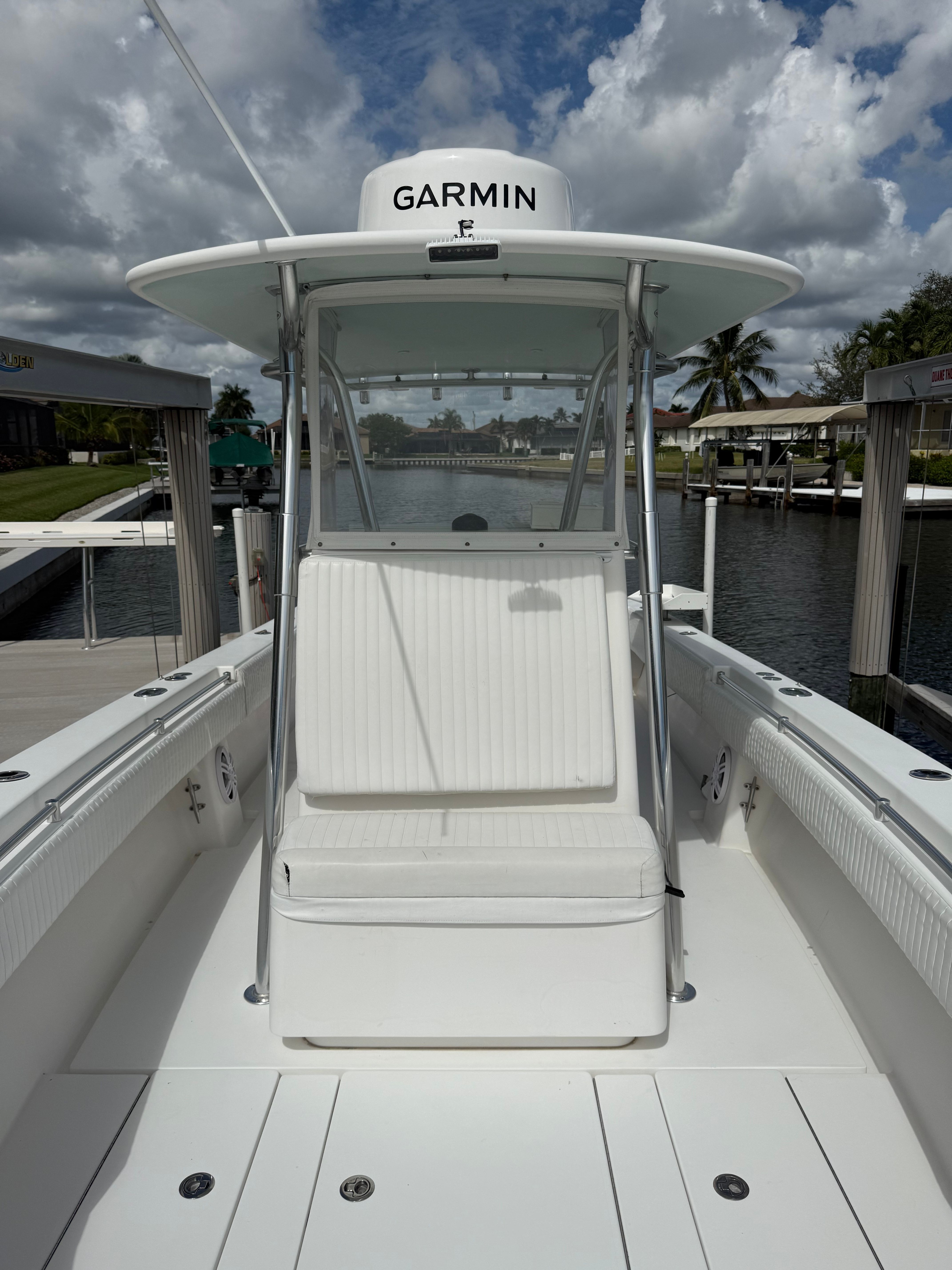 2012 Contender 32 ST boat with Garmin equipment at dock.