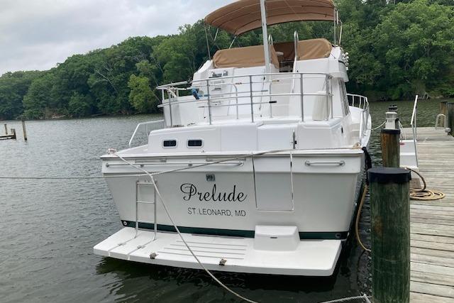 2000 Mainship 430 Trawler docked, named "Prelude," in St. Leonard, MD.