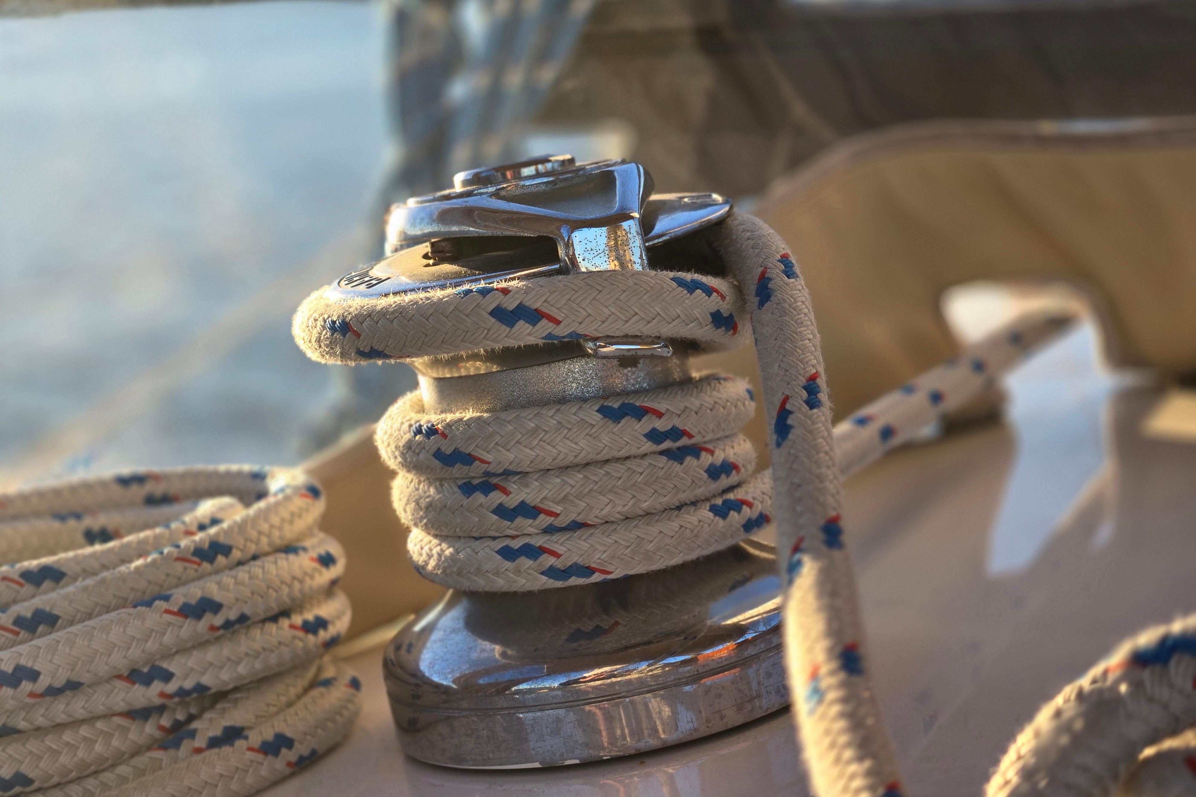 Close-up of winch and rope on 1970 Hinckley Bermuda 40 sailboat deck.