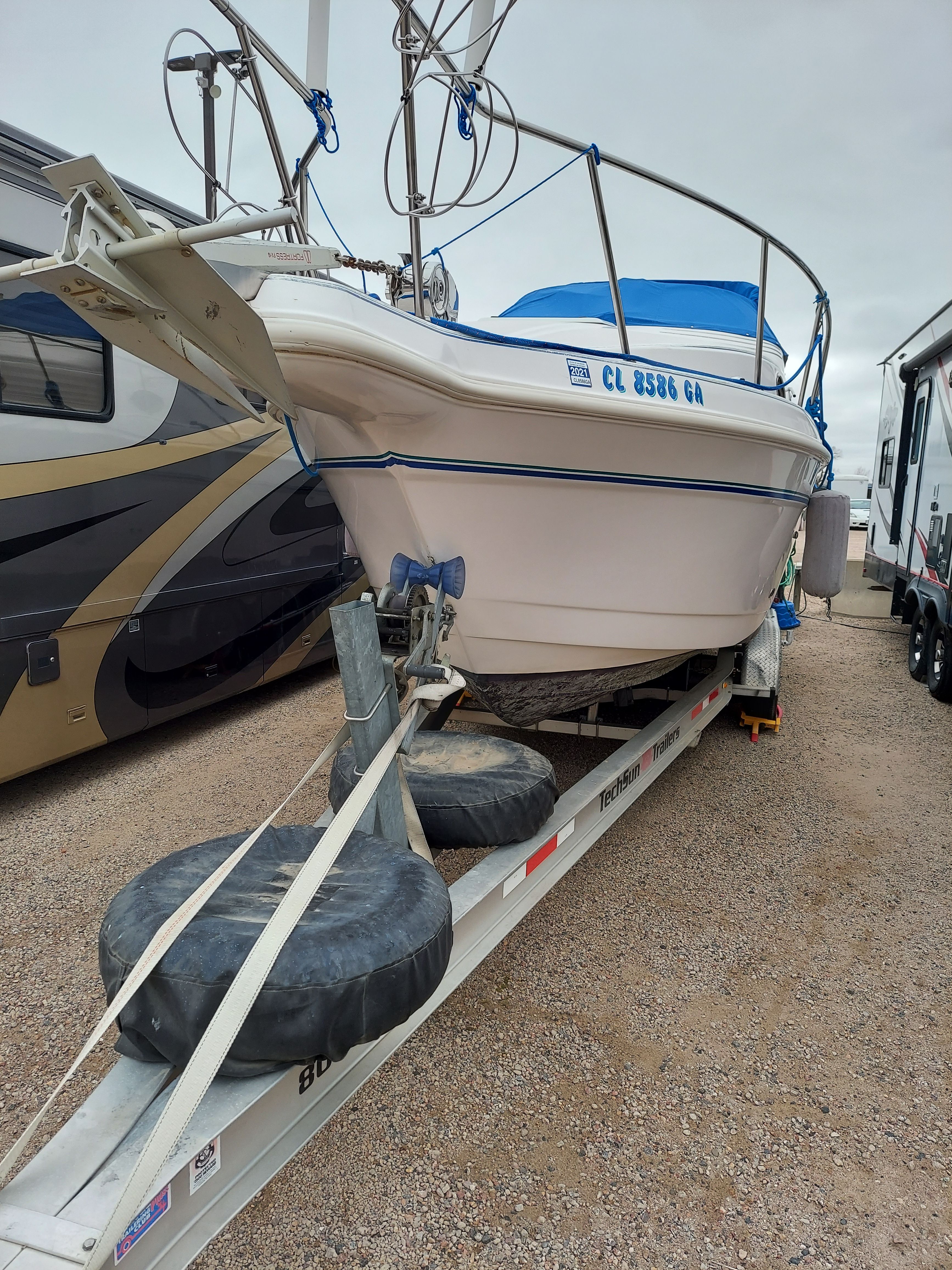 1997 Donzi 275LXC boat parked on a trailer.