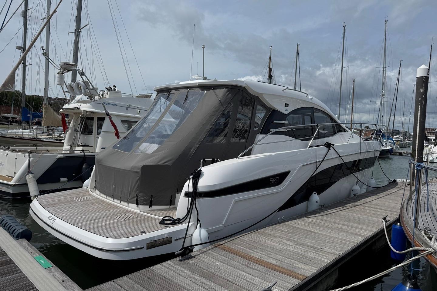 2023 Bavaria SR41 yacht docked at marina, featuring sleek design and modern amenities.