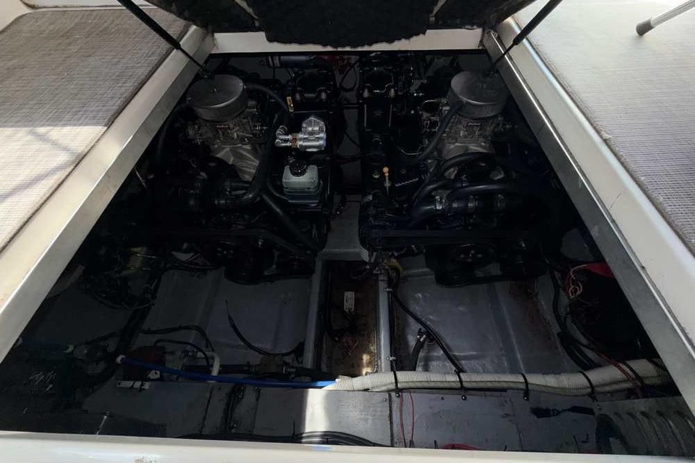 Engine compartment of a 2001 Monterey 282 Cruiser boat, showing dual engines.