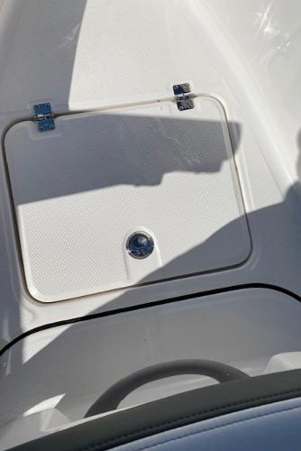 2024 Robalo R222 Center Console storage compartment.