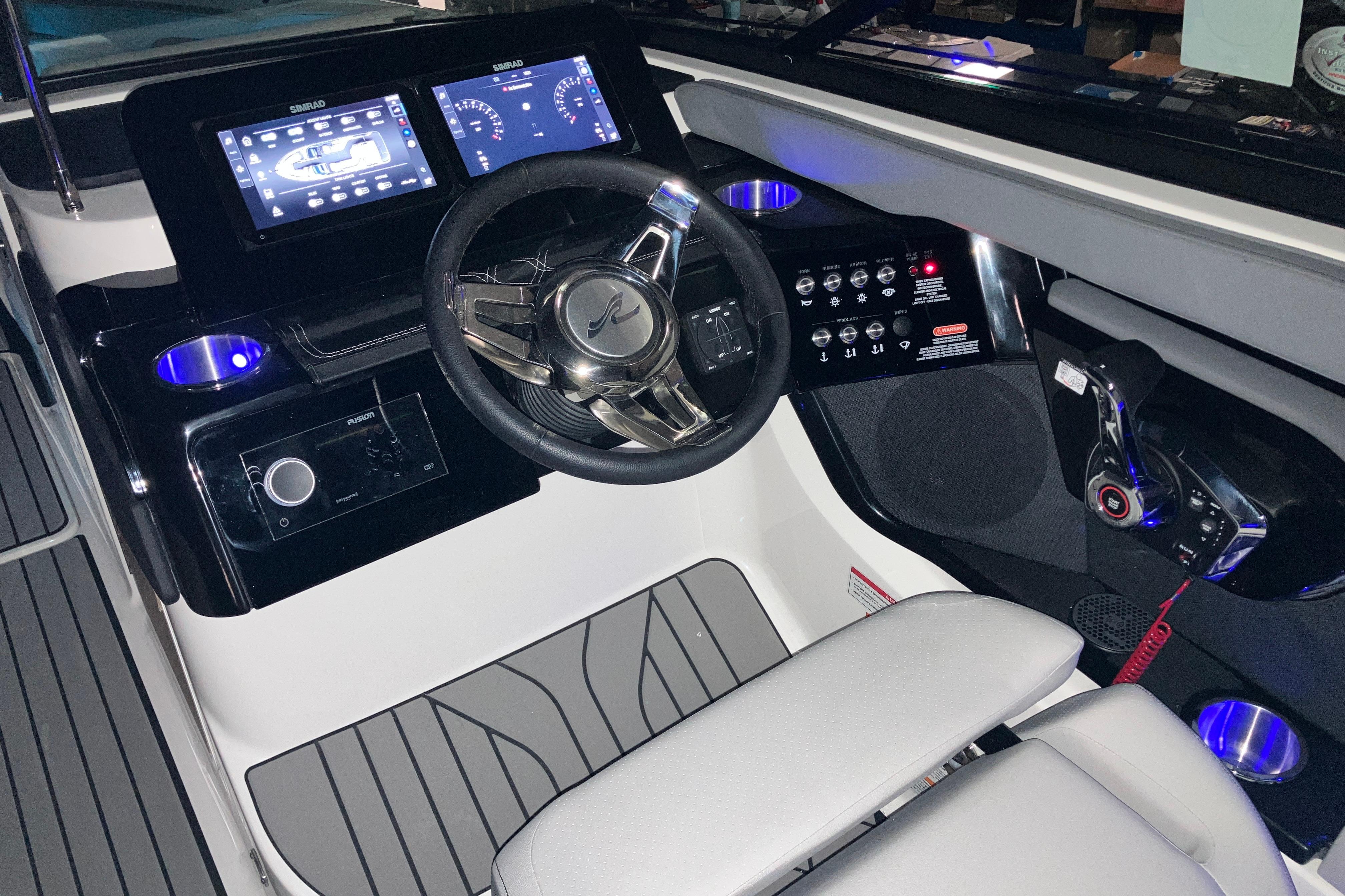 2026 Sea Ray SLX 260 Outboard helm with modern controls and digital displays.