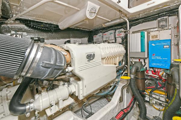 Engine room of 2008 Tiara Yachts 4200 Open, showcasing detailed mechanical components.