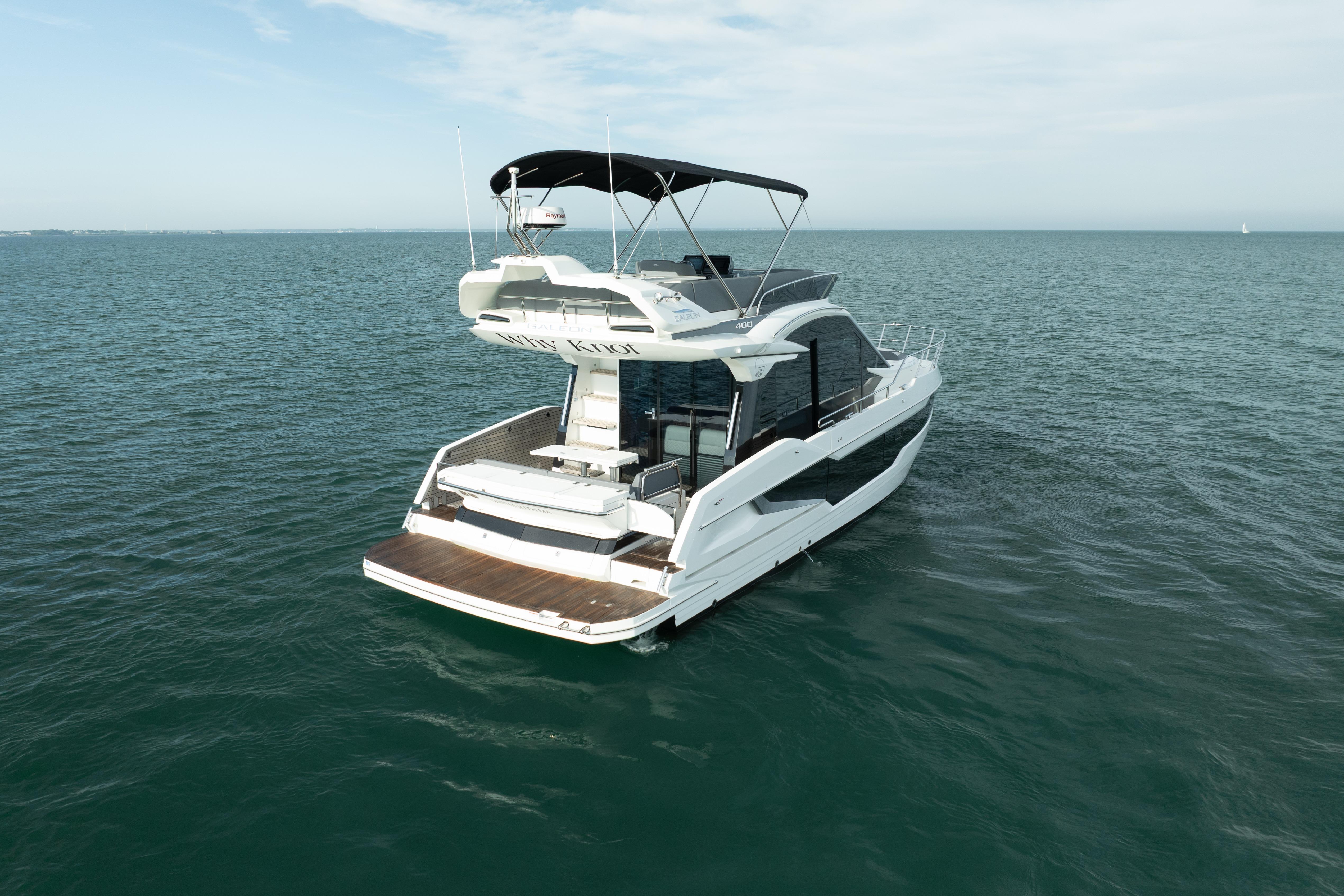2023 Galeon 400 Fly yacht on open water, showcasing sleek design and spacious deck.
