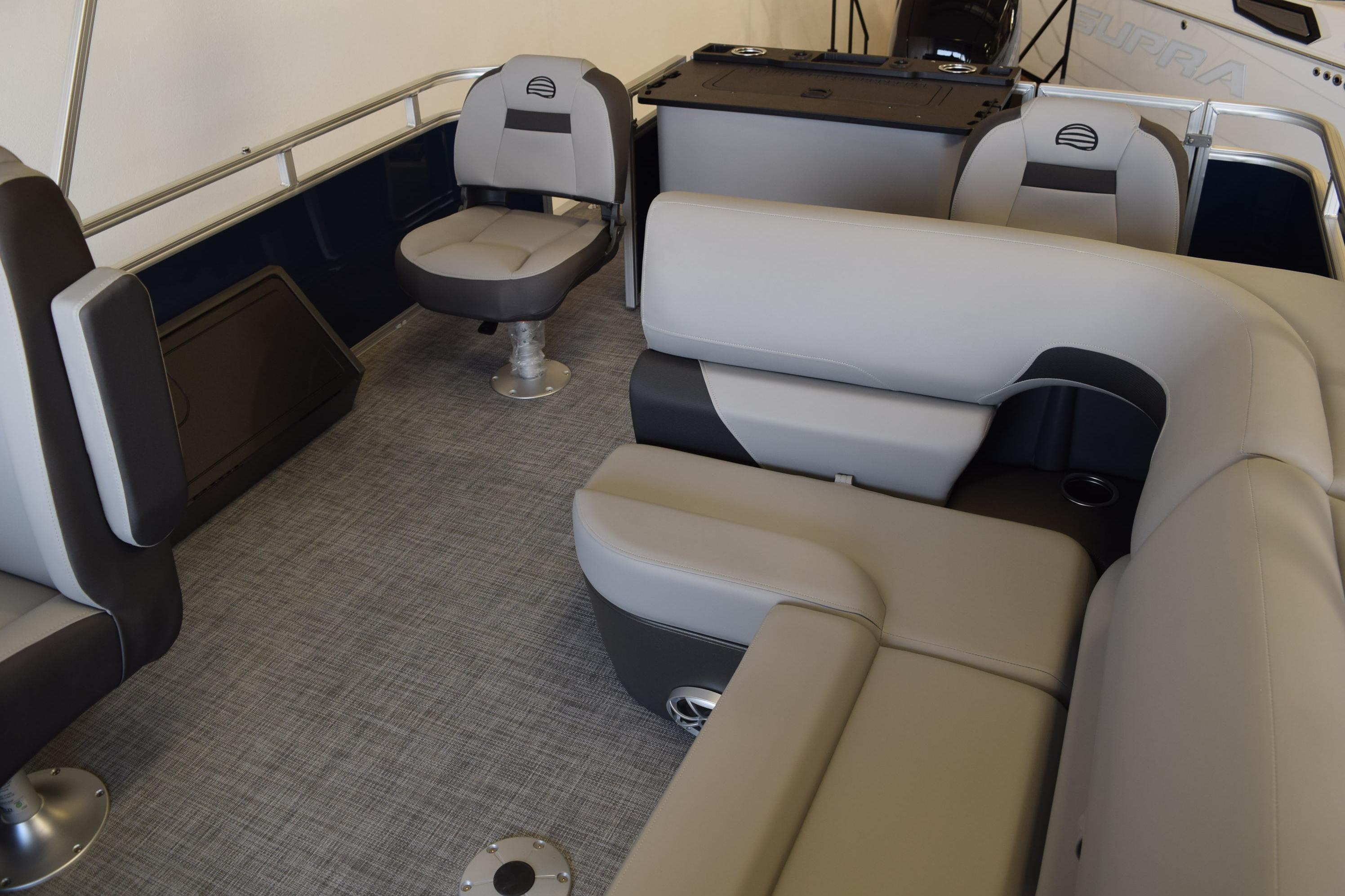 2026 Sun Tracker SportFish 22 DLX interior with gray seating and modern design.