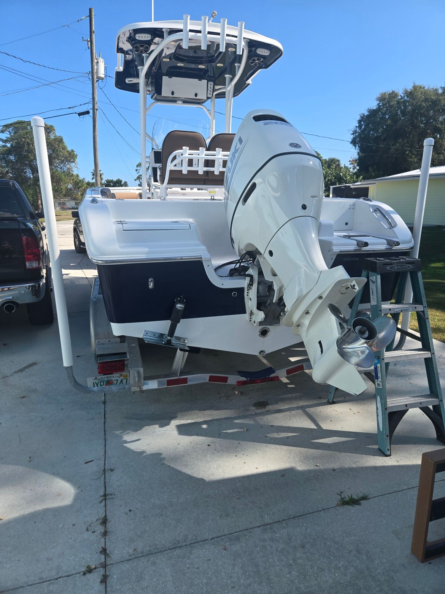 2018 Sea Pro 21.9 boat with outboard motor on trailer.