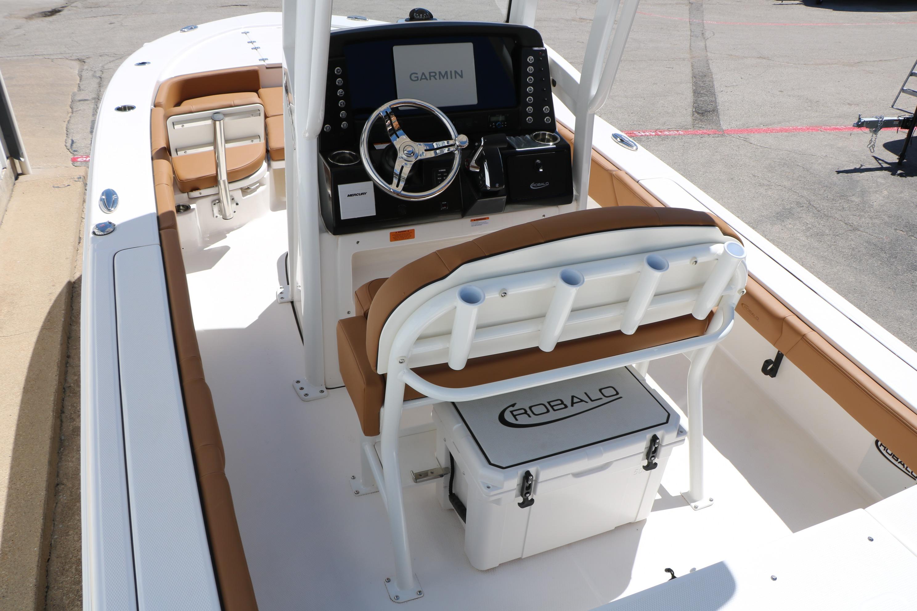 2026 Robalo 246 Cayman boat interior with Garmin navigation and seating.