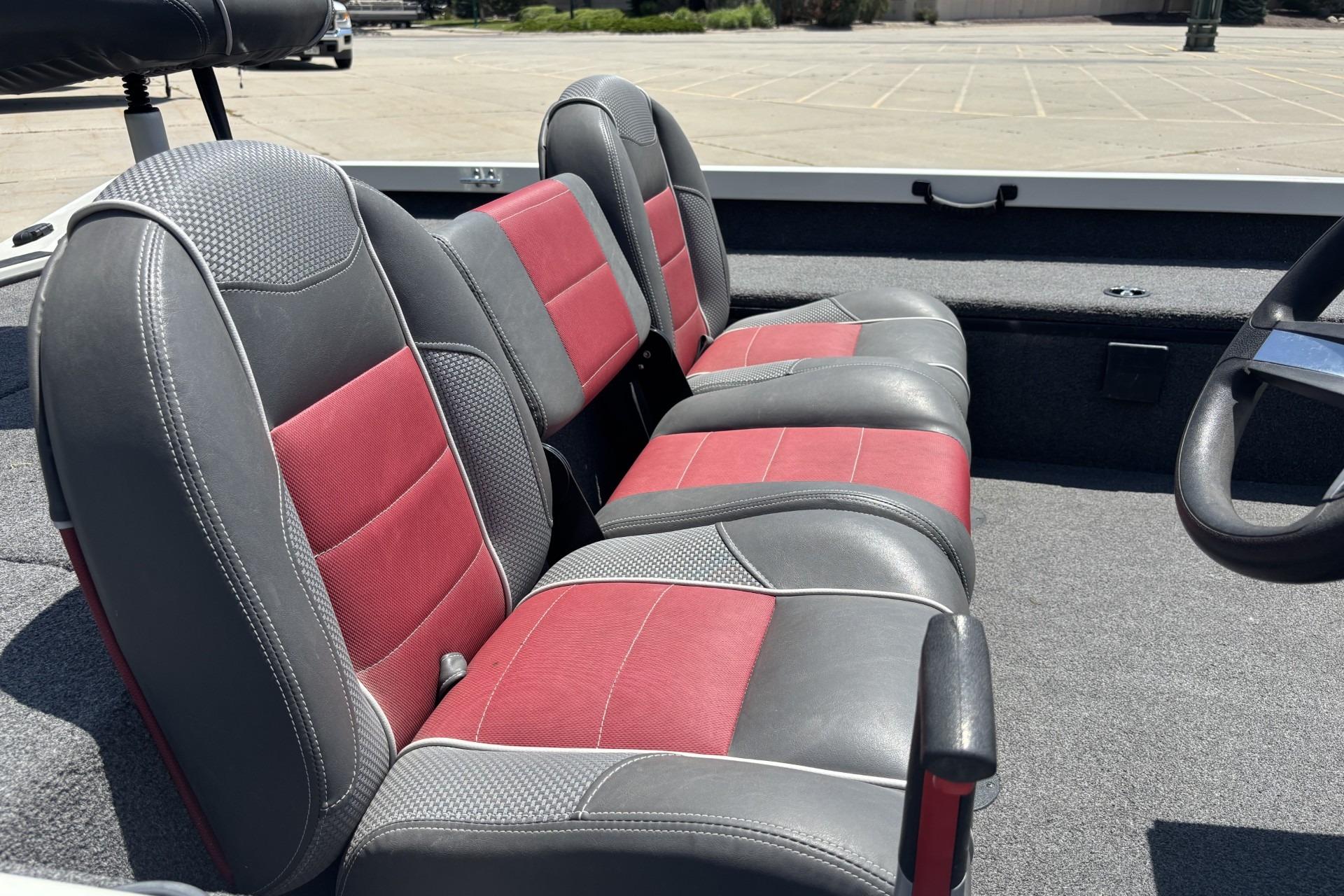 2017 Ranger RT178C boat interior with red and gray seating, steering wheel visible.