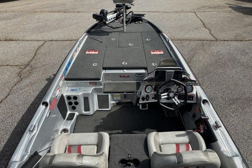 2020 Bass Cat Cougar FTD boat interior with steering console and seating.