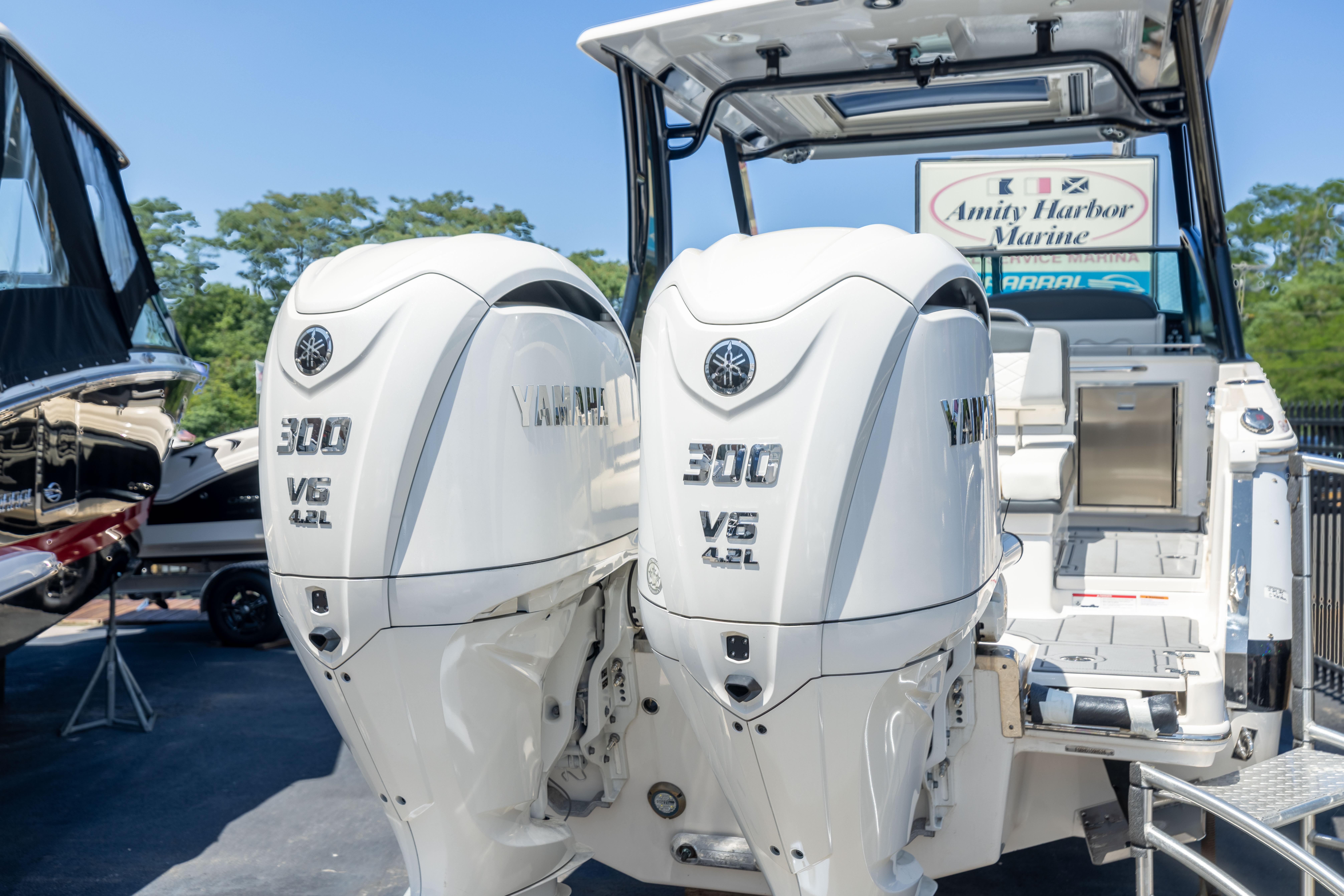 2026 Chaparral 310 OSX with twin Yamaha 300 V6 outboard engines at Amity Harbor Marine.