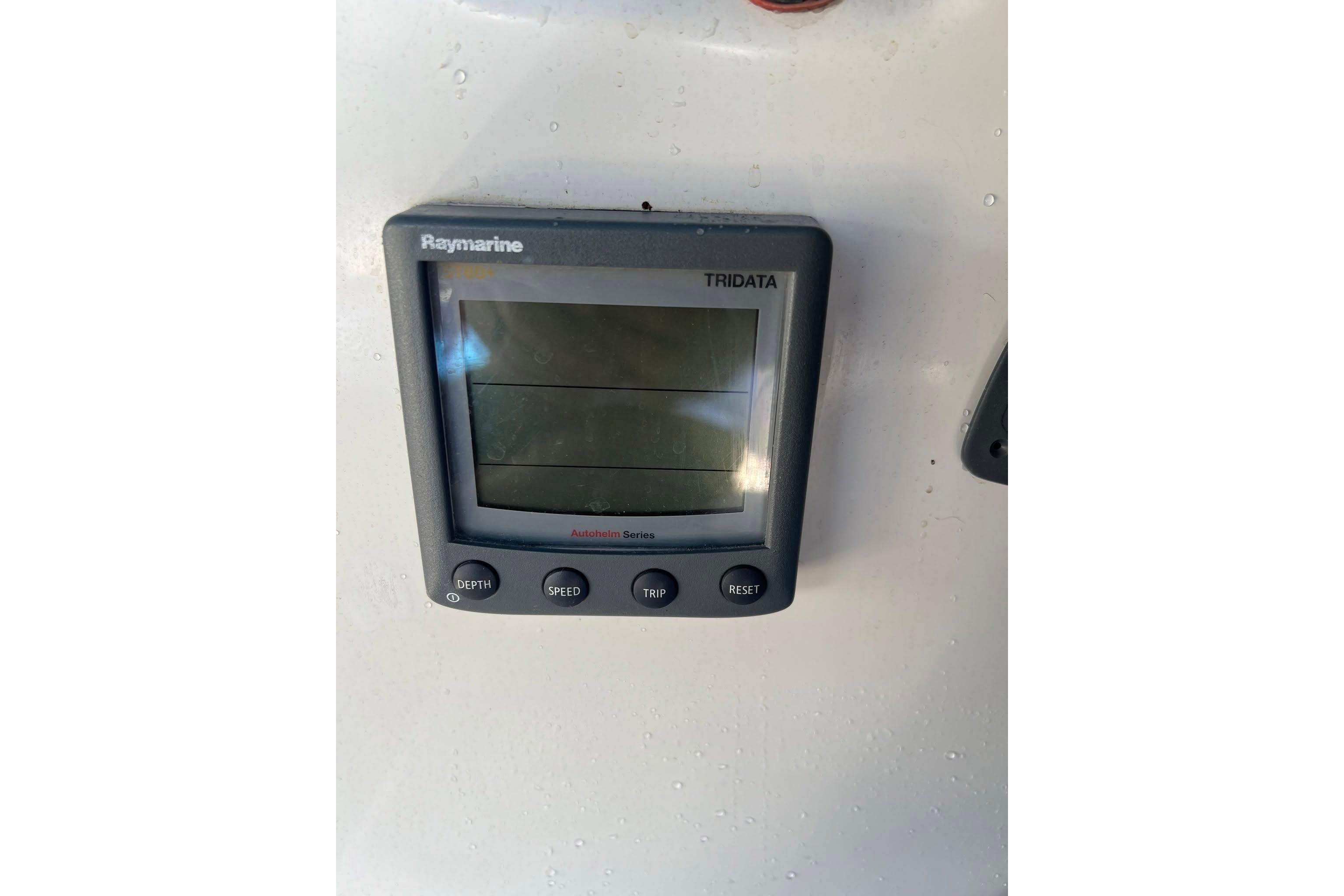 Raymarine Tridata display on 1993 Corsair F-27 sailboat, showing depth, speed, and trip data.