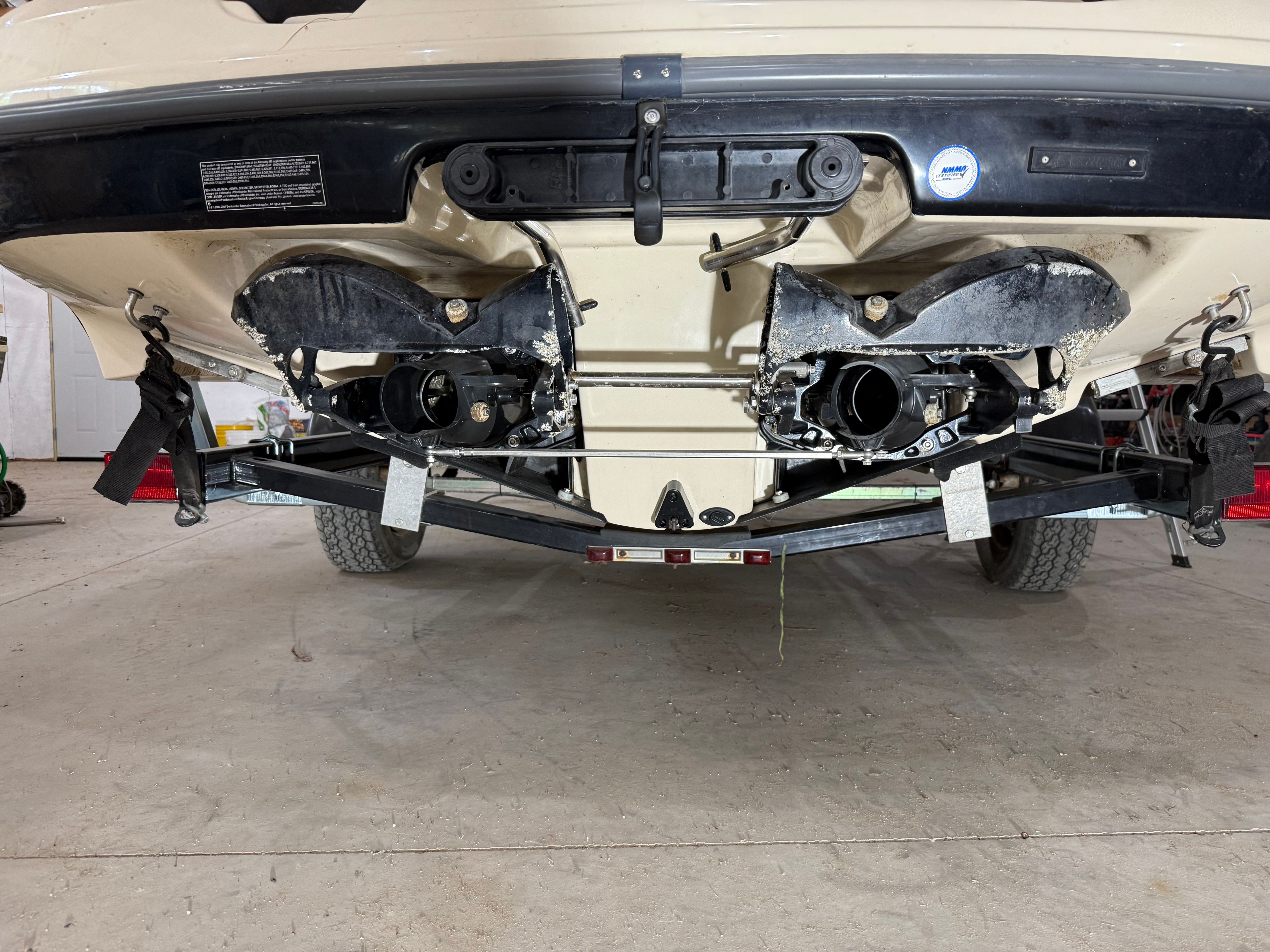 Rear view of a Sea-Doo Utopia 205SE on a trailer.
