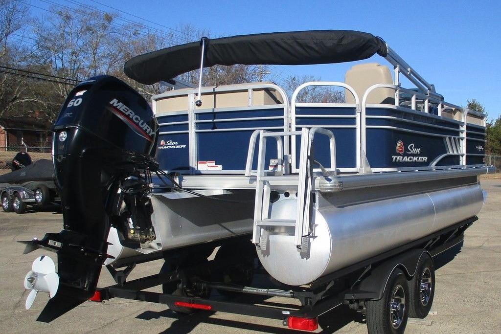 2022 Sun Tracker Party Barge 20 DLX pontoon boat with Mercury outboard motor.