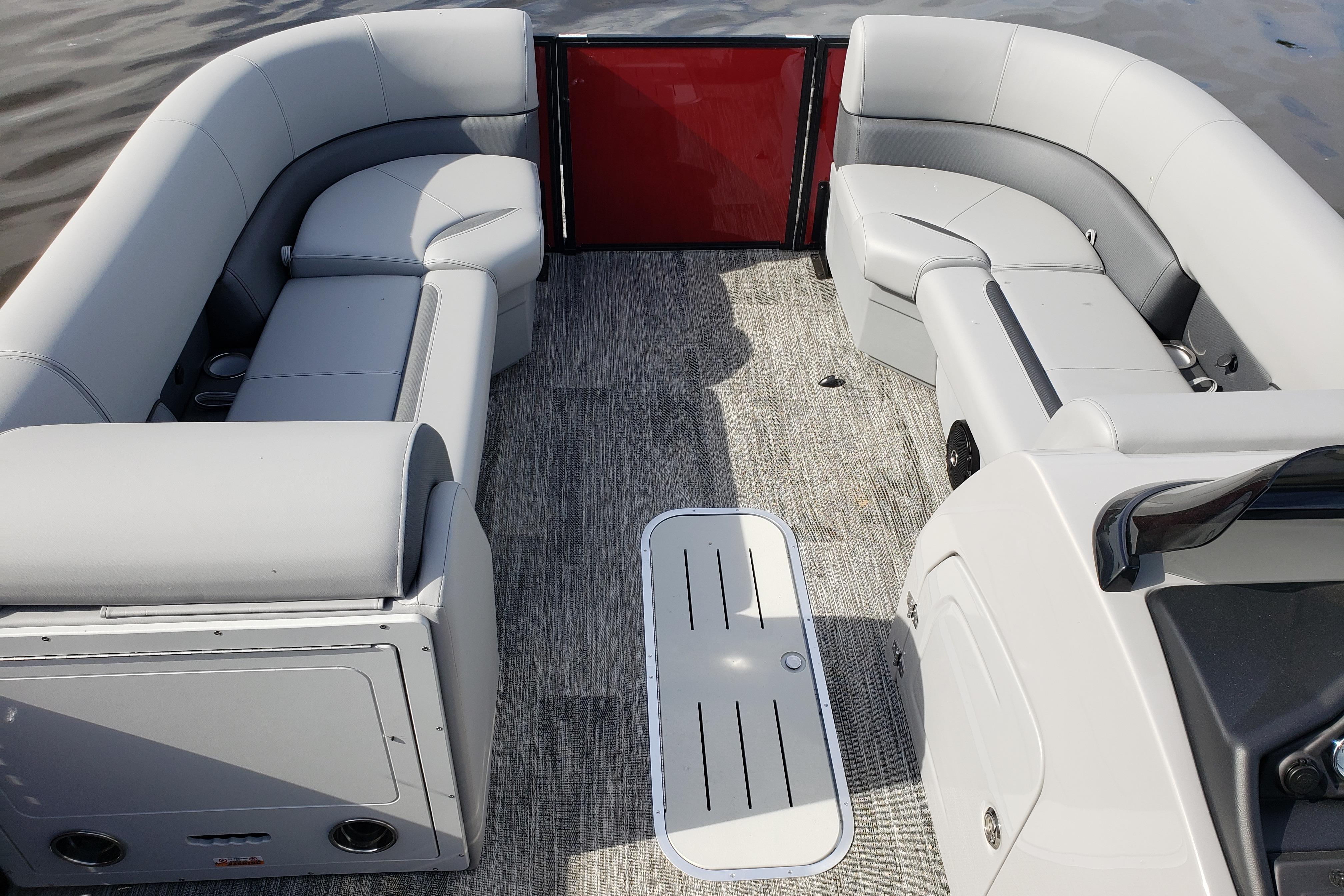 2026 Bentley Pontoons Legacy 243 Navigator Ext interior with gray seating and modern design.