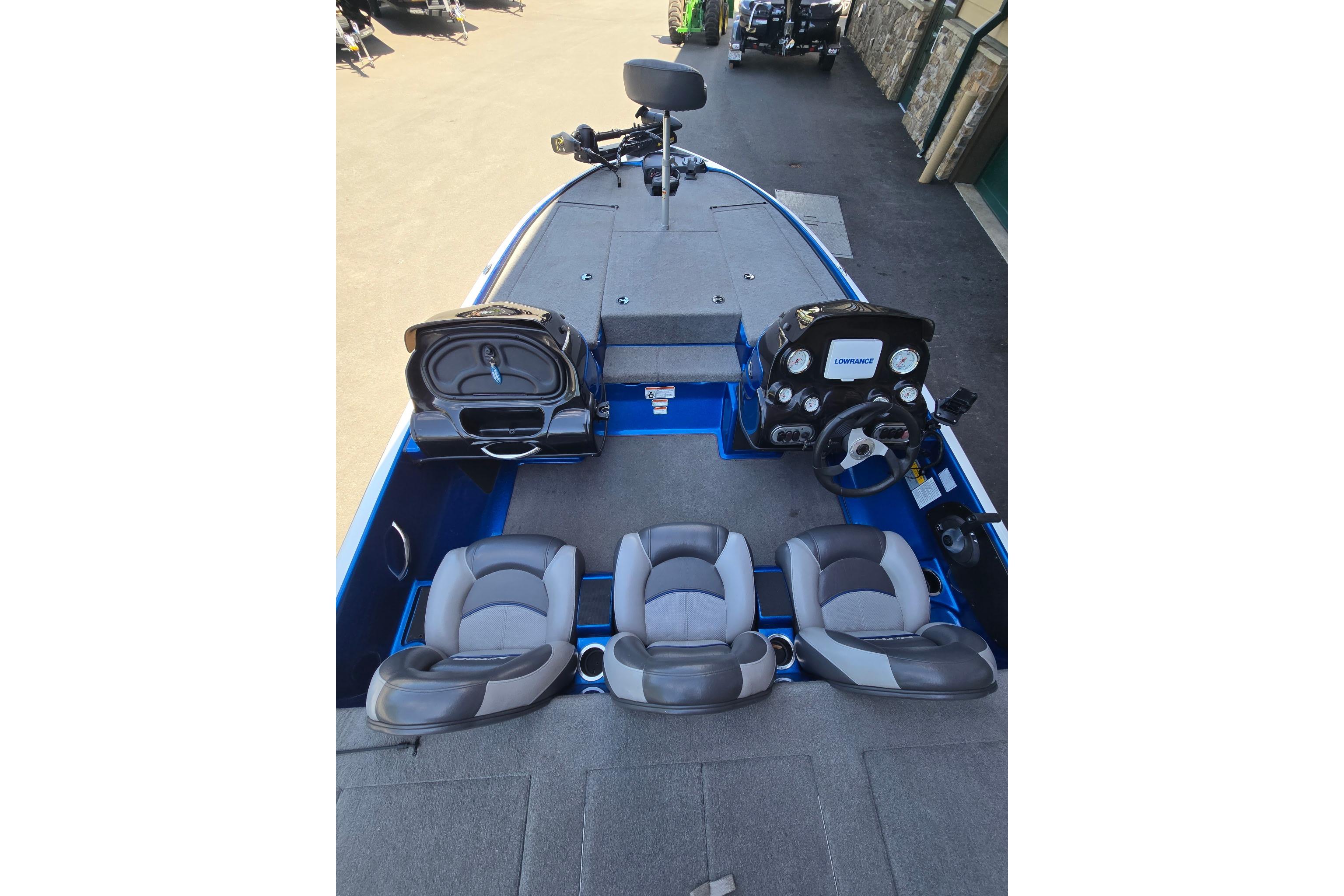 2014 Nitro Z-7 boat interior with seating, steering console, and storage compartments.