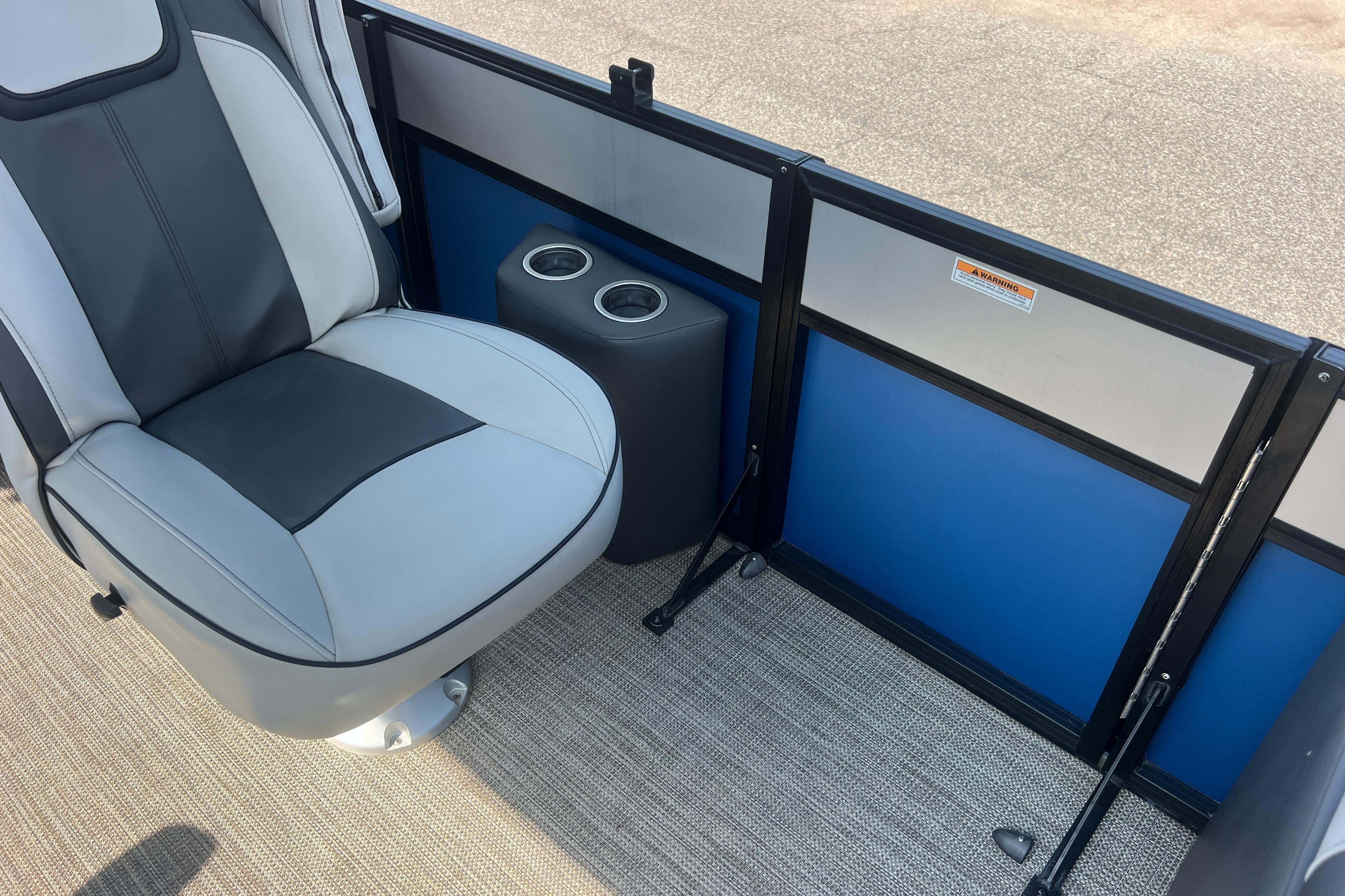 Interior of 2022 Viaggio Lago V-U 22 boat with seat and cup holders.