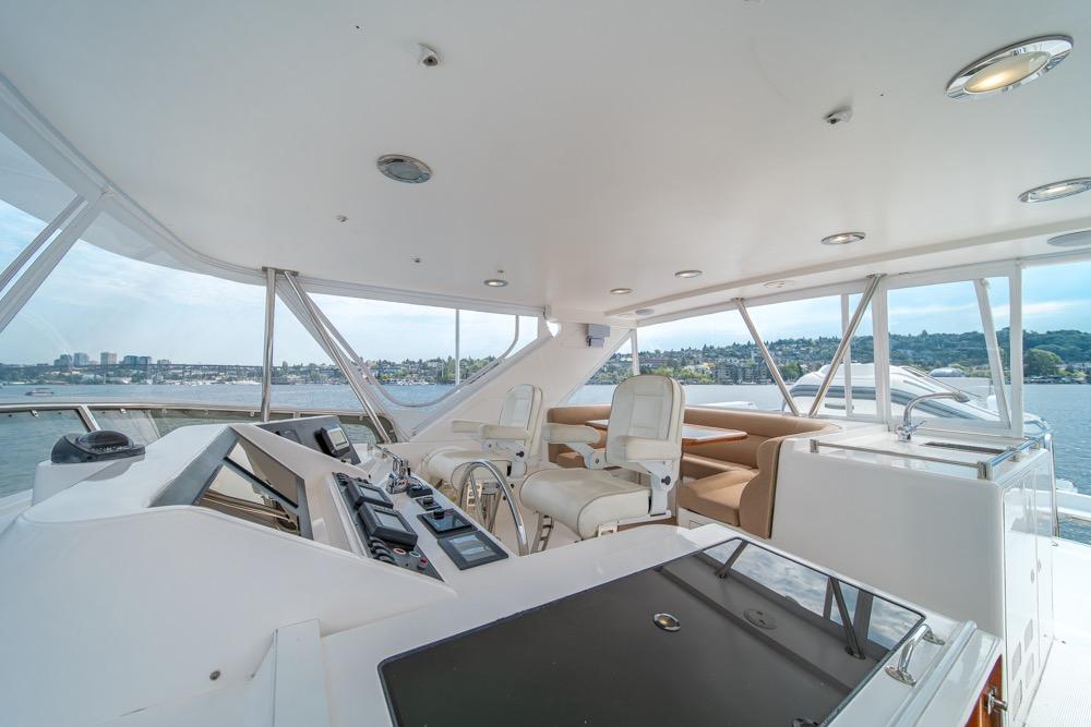2005 Ocean Alexander 64 Motoryacht helm with panoramic water views.