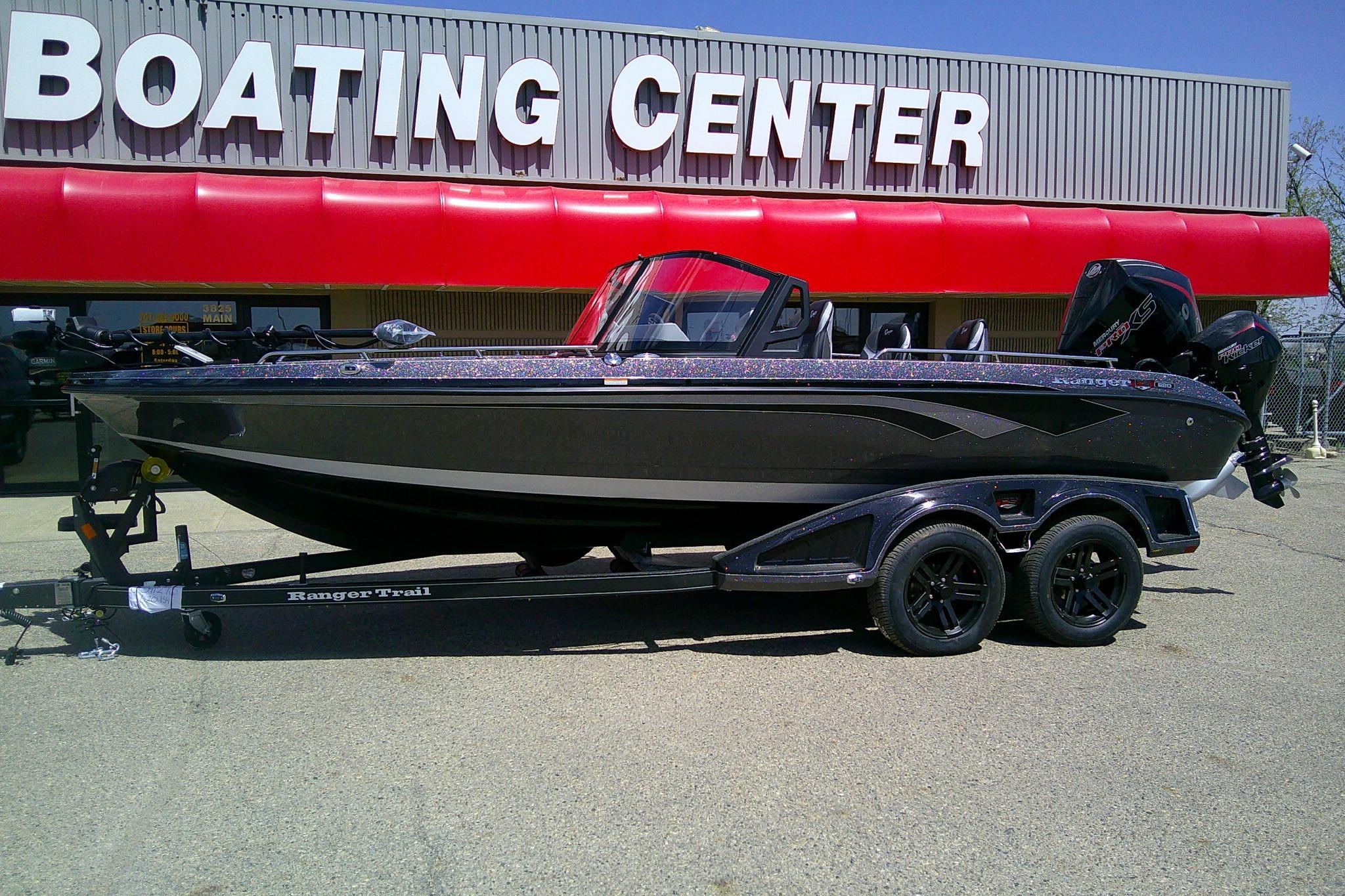 2026 Ranger 620FS Cup-Equipped boat on trailer outside Boating Center.