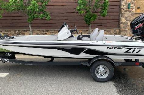 2026 Nitro Z17 boat, sleek design, parked on trailer, side view.