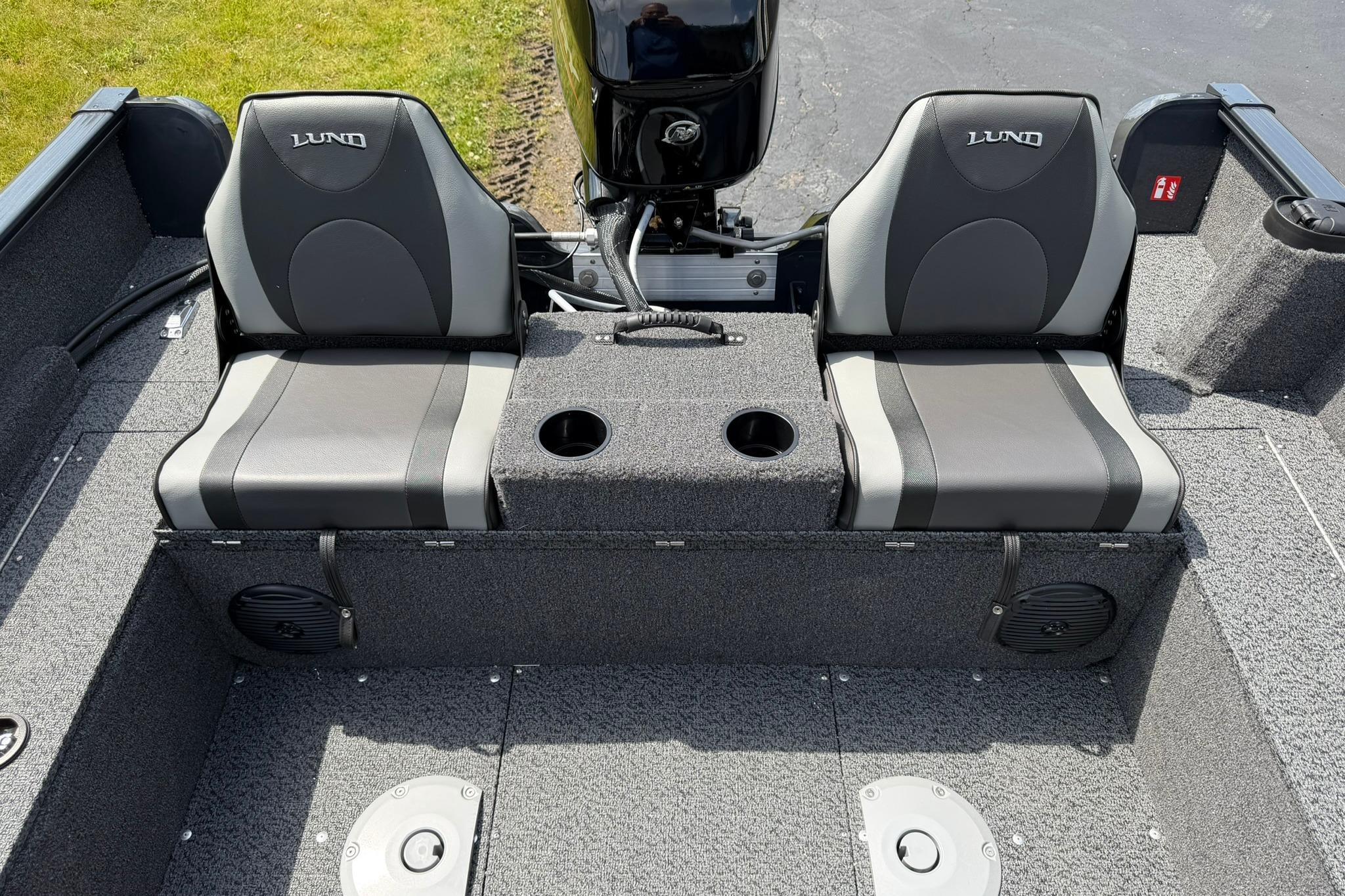 2027 Lund 1650 Rebel XL SS boat interior with dual seats and storage compartments.