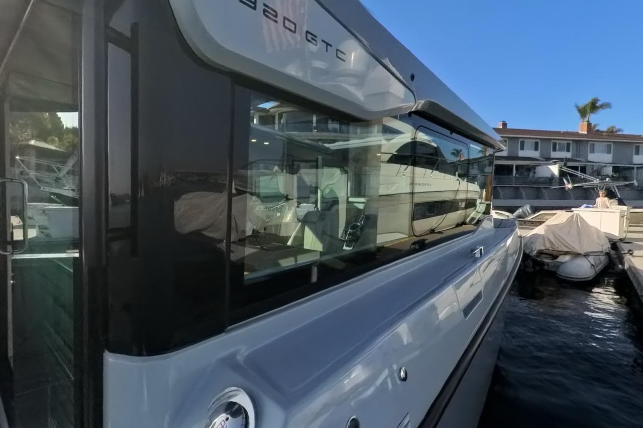 2024 Saxdor 320 GTC yacht docked, showcasing sleek design and modern features.