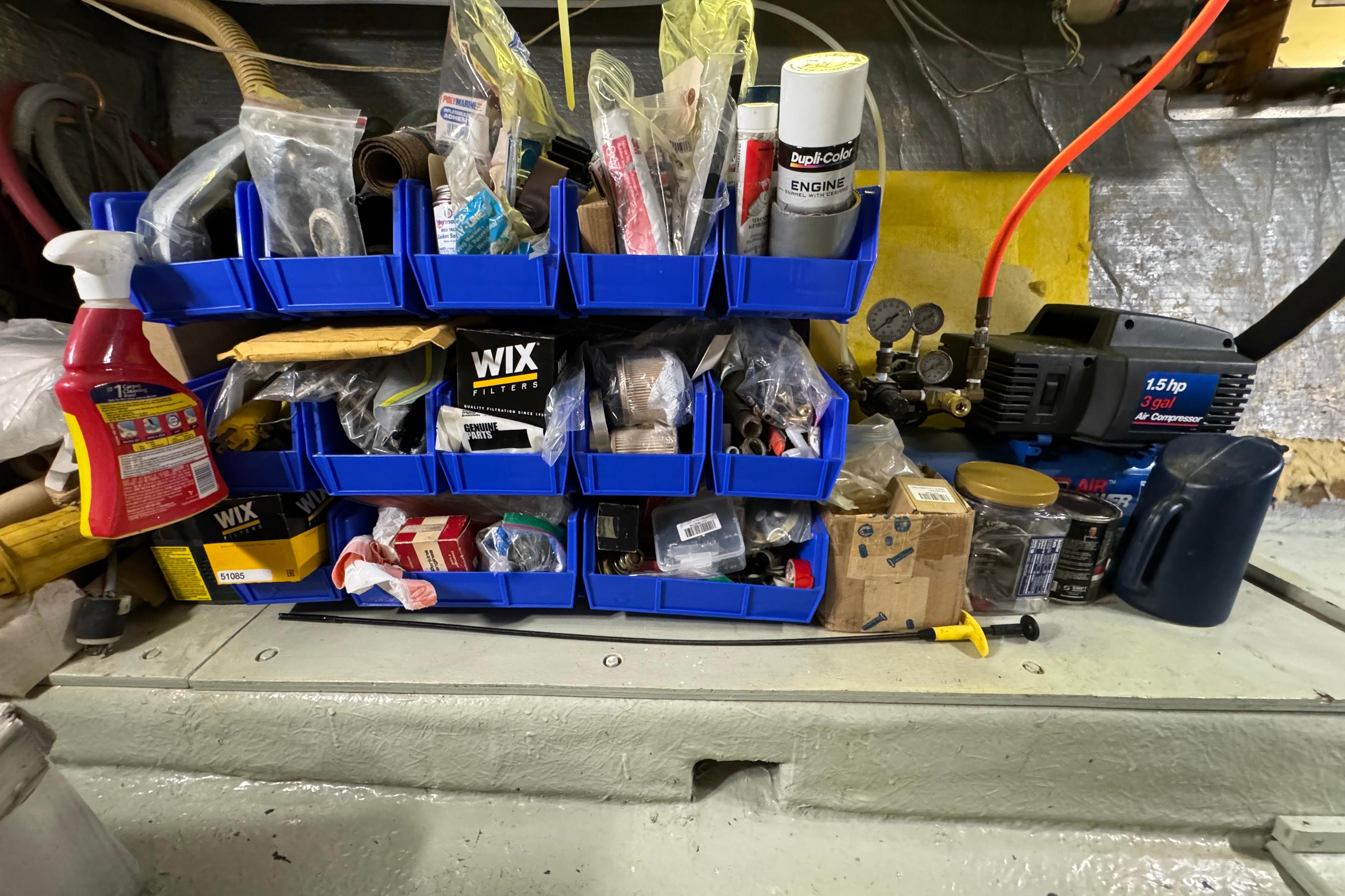 Organized storage of tools and supplies in a 1978 Californian 42 LRC engine room.