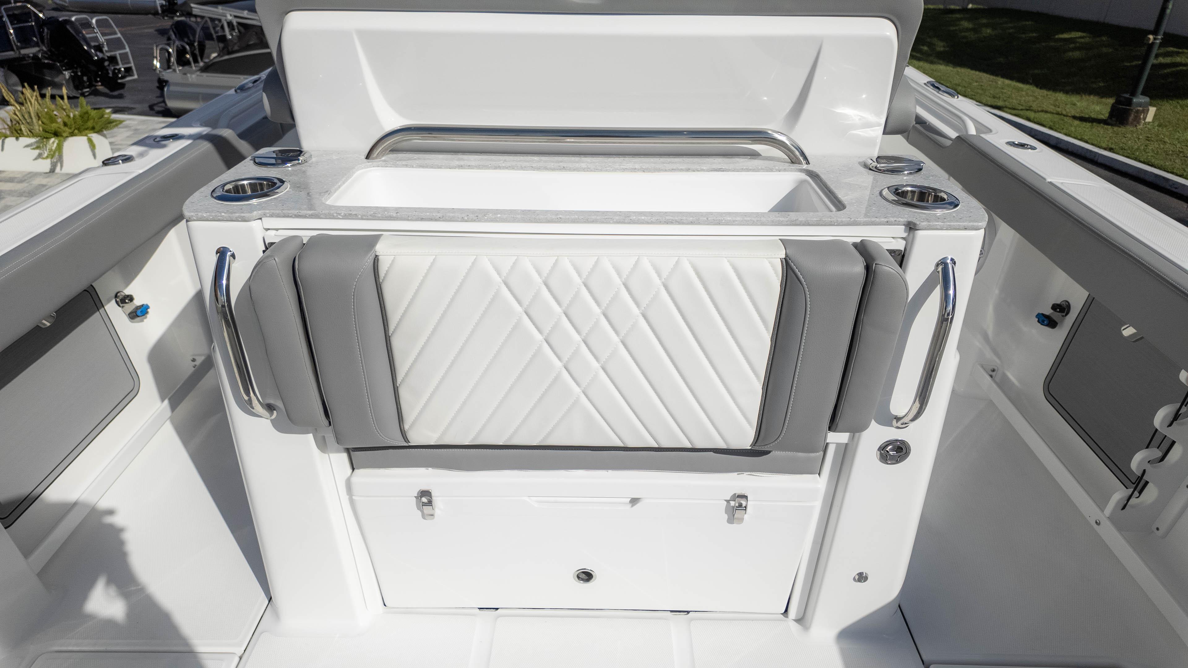 2025 Everglades 315 Center Console boat interior with sleek seating and storage.