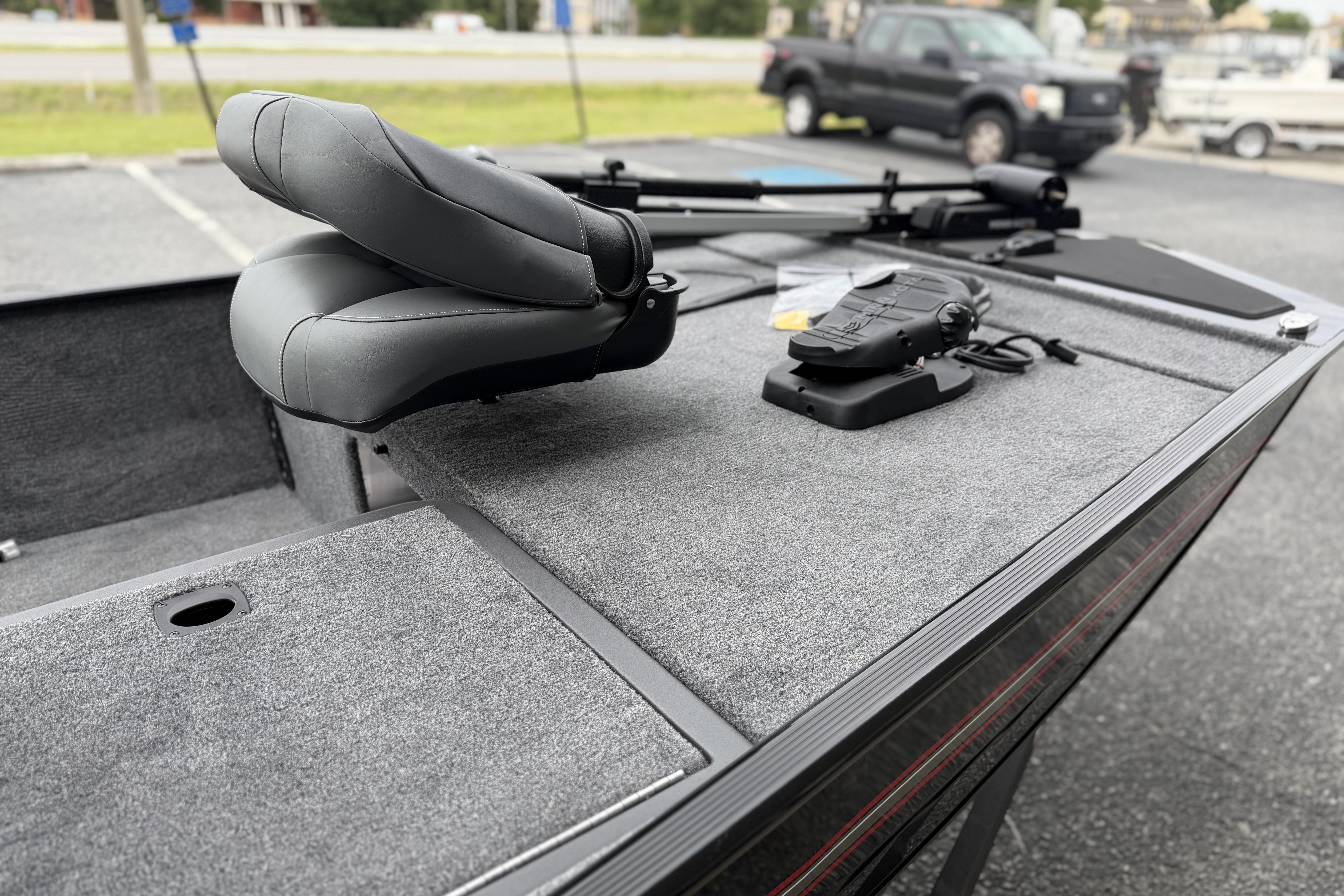 2026 Tracker Bass Tracker Classic XL boat interior with seating and control panel.
