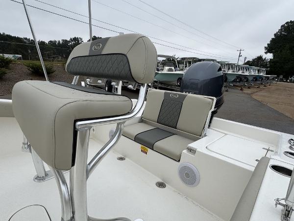 2025 Key West 179 FS boat interior with cushioned seating and sleek design.