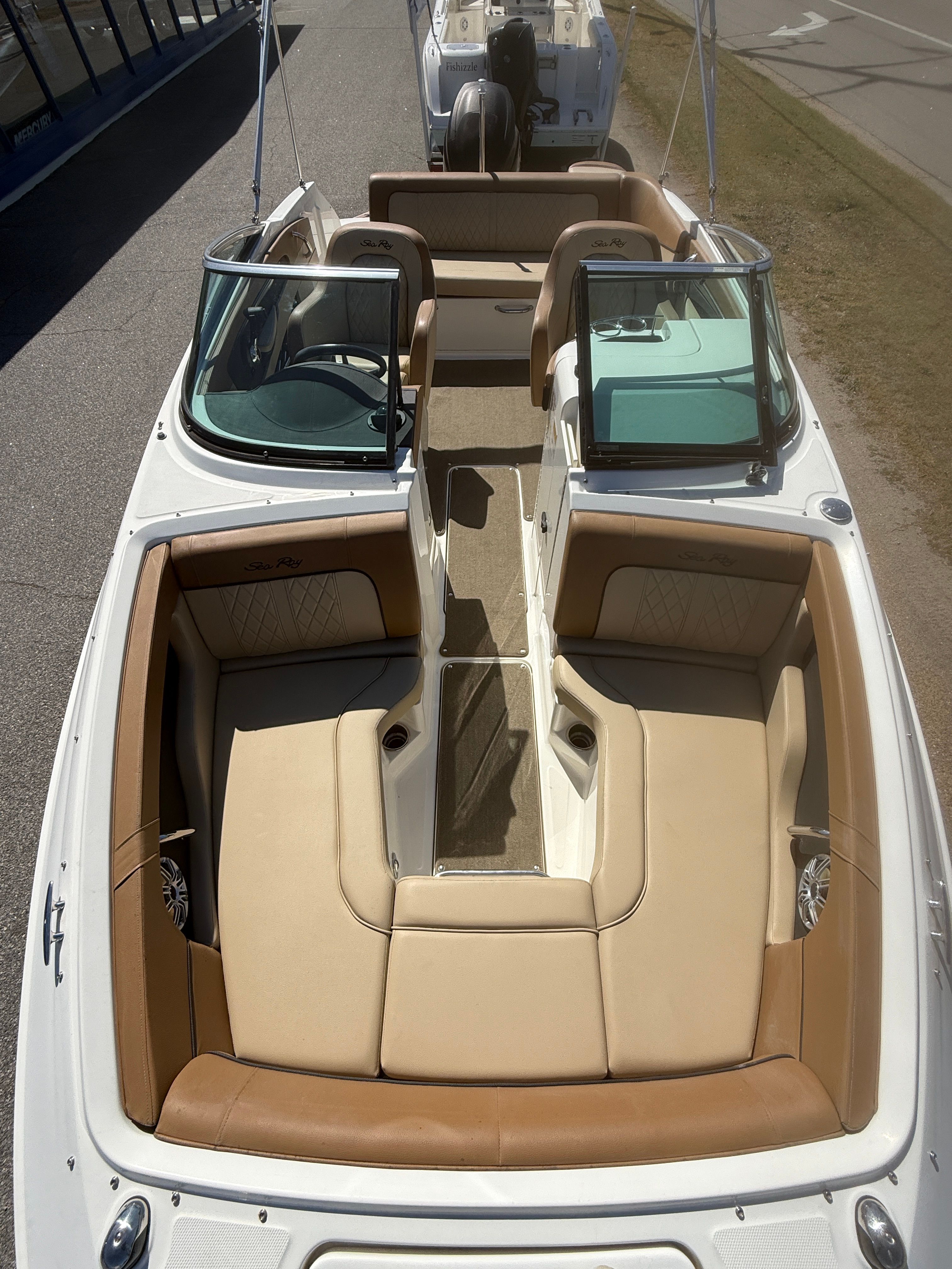 2015 Sea Ray 220 Sundeck OB with beige interior.