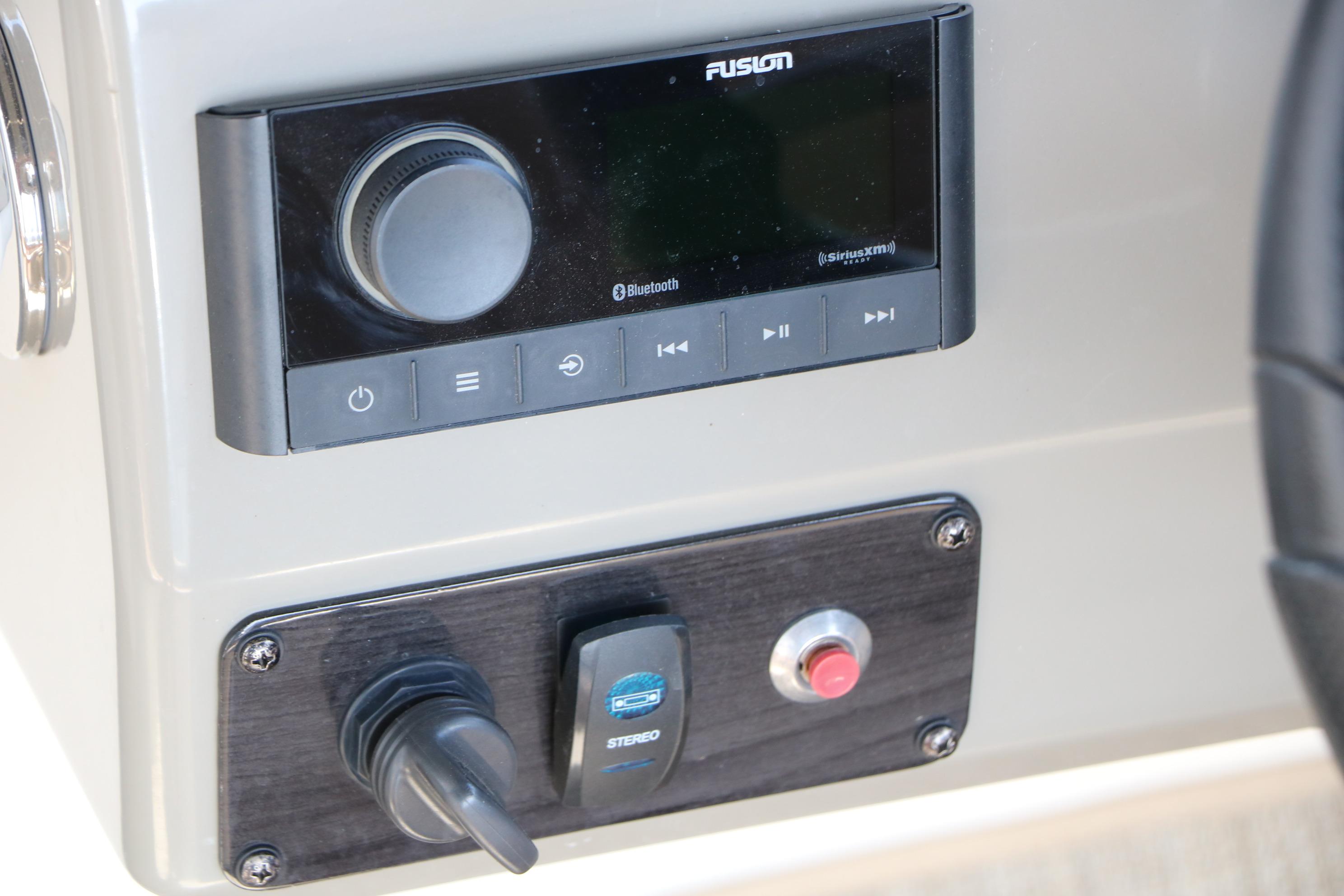 2022 Stingray 192 SC boat dashboard featuring Fusion Bluetooth stereo system.