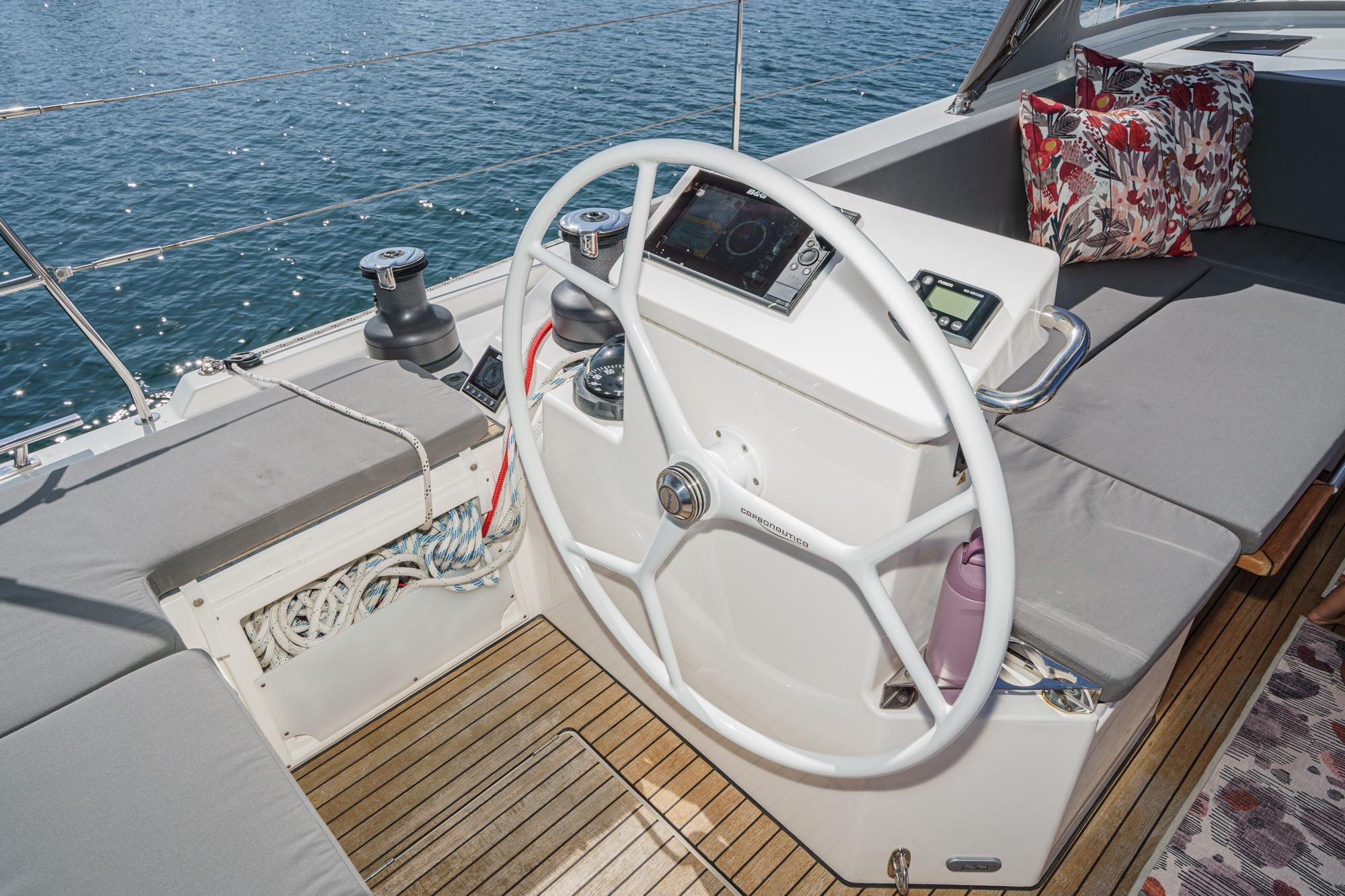 2023 Bavaria C50 yacht helm with modern controls and comfortable seating.