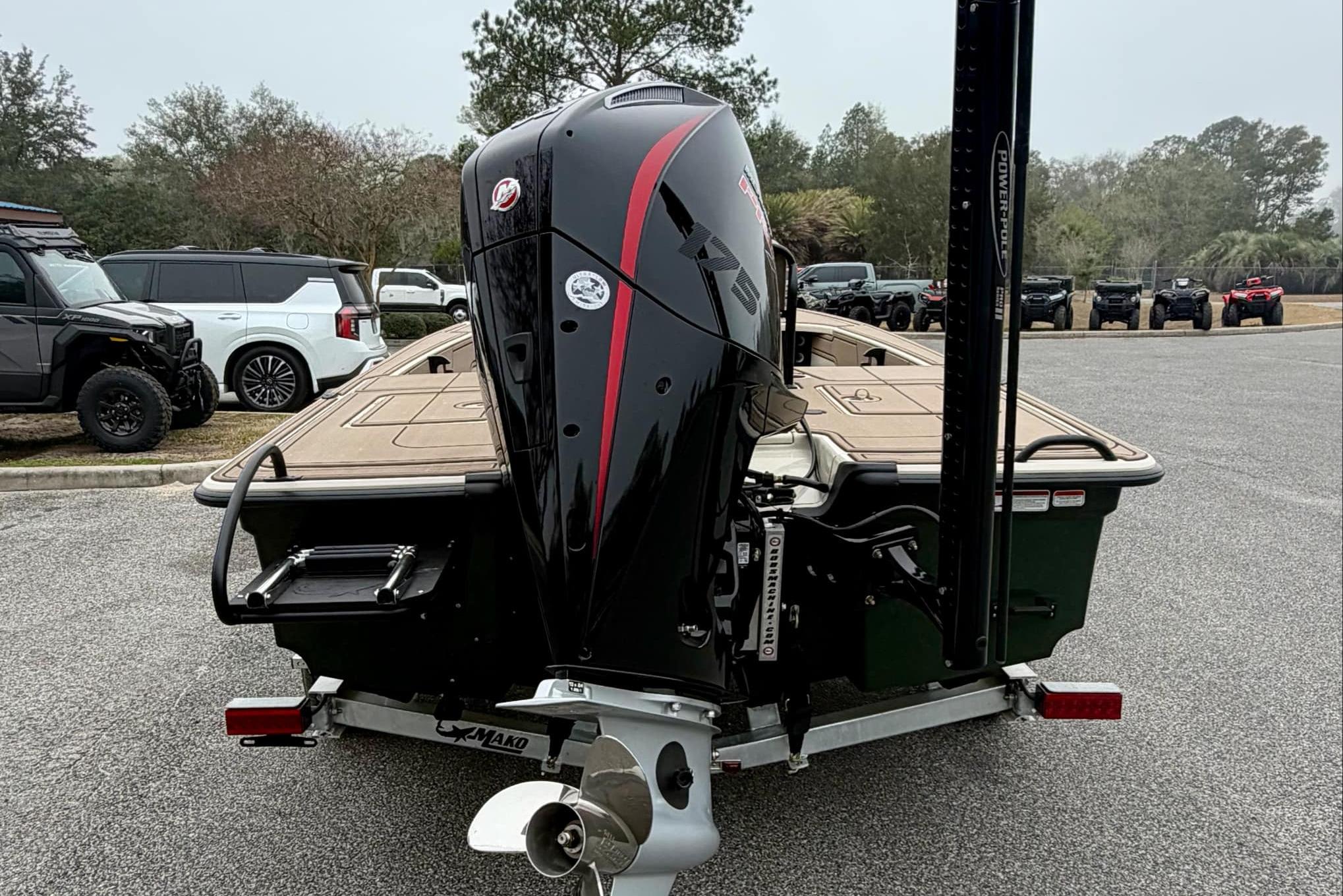 2025 Mako 18 Pro Skiff Backwater Edition boat with powerful outboard motor.