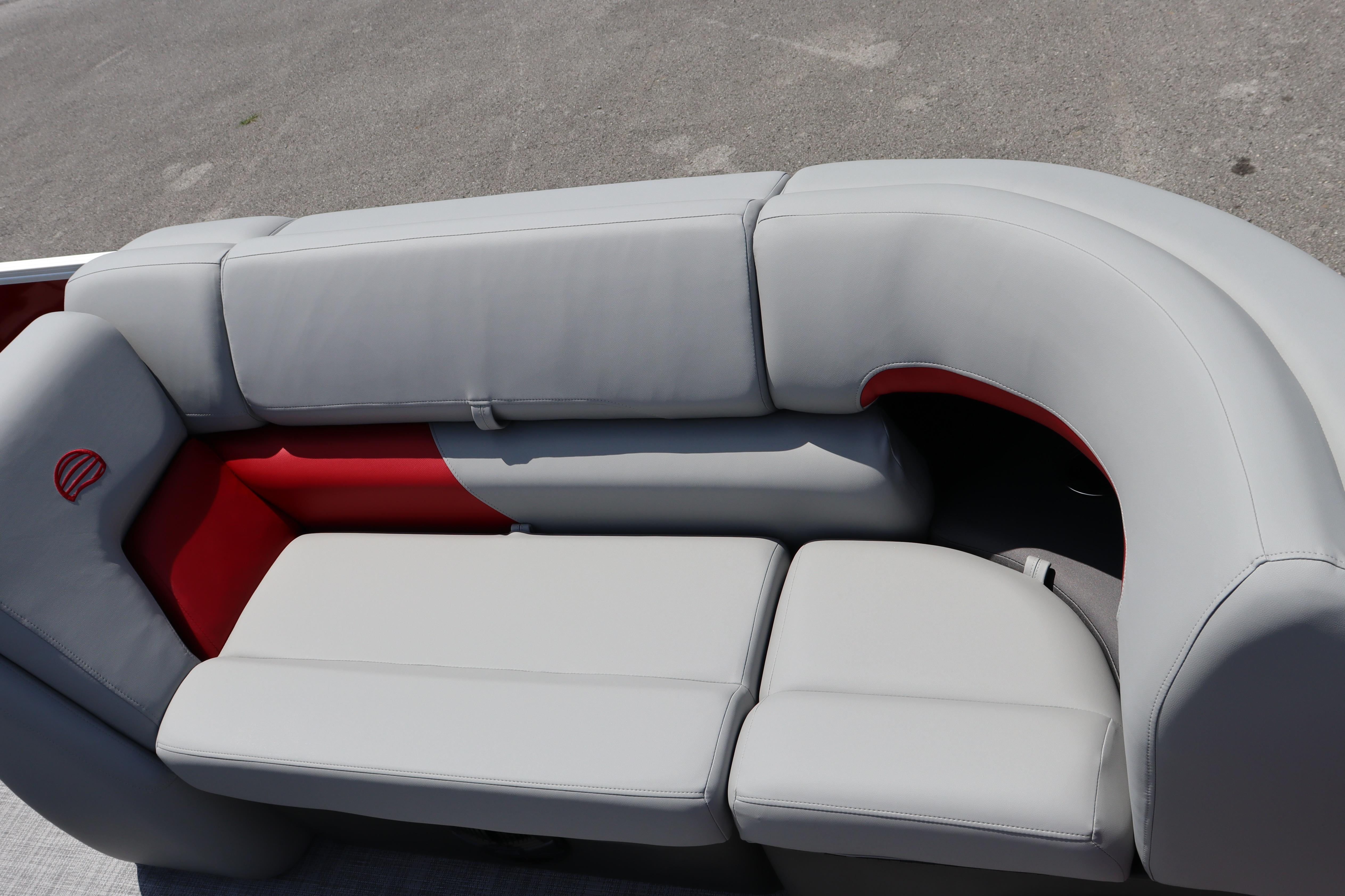 2026 Sun Tracker Party Barge 22 XP3, gray and red seating detail on deck.