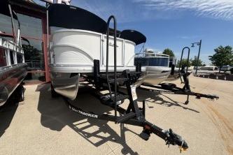 2026 Sun Tracker Party Barge 16 DLX pontoon boat on trailer.