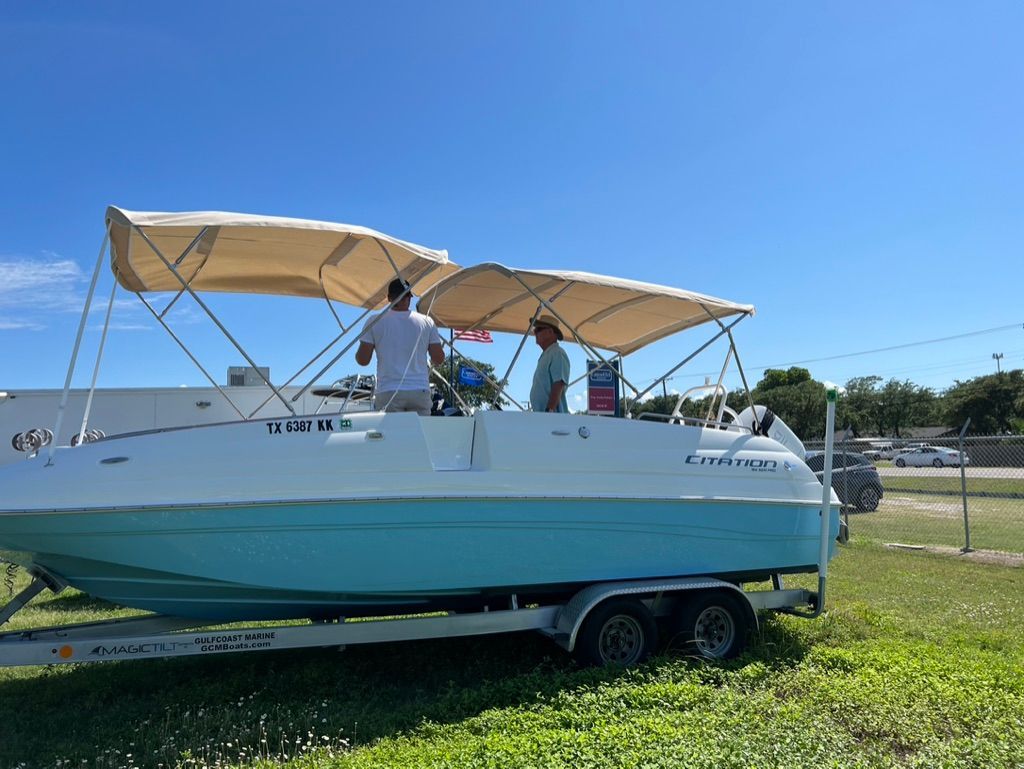 Sea Pro Citation 2021 boat on trailer in sunny weather.