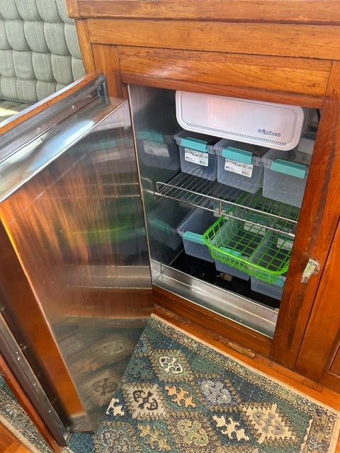 Open fridge on Grand Banks 32 Sedan, 1980 model.